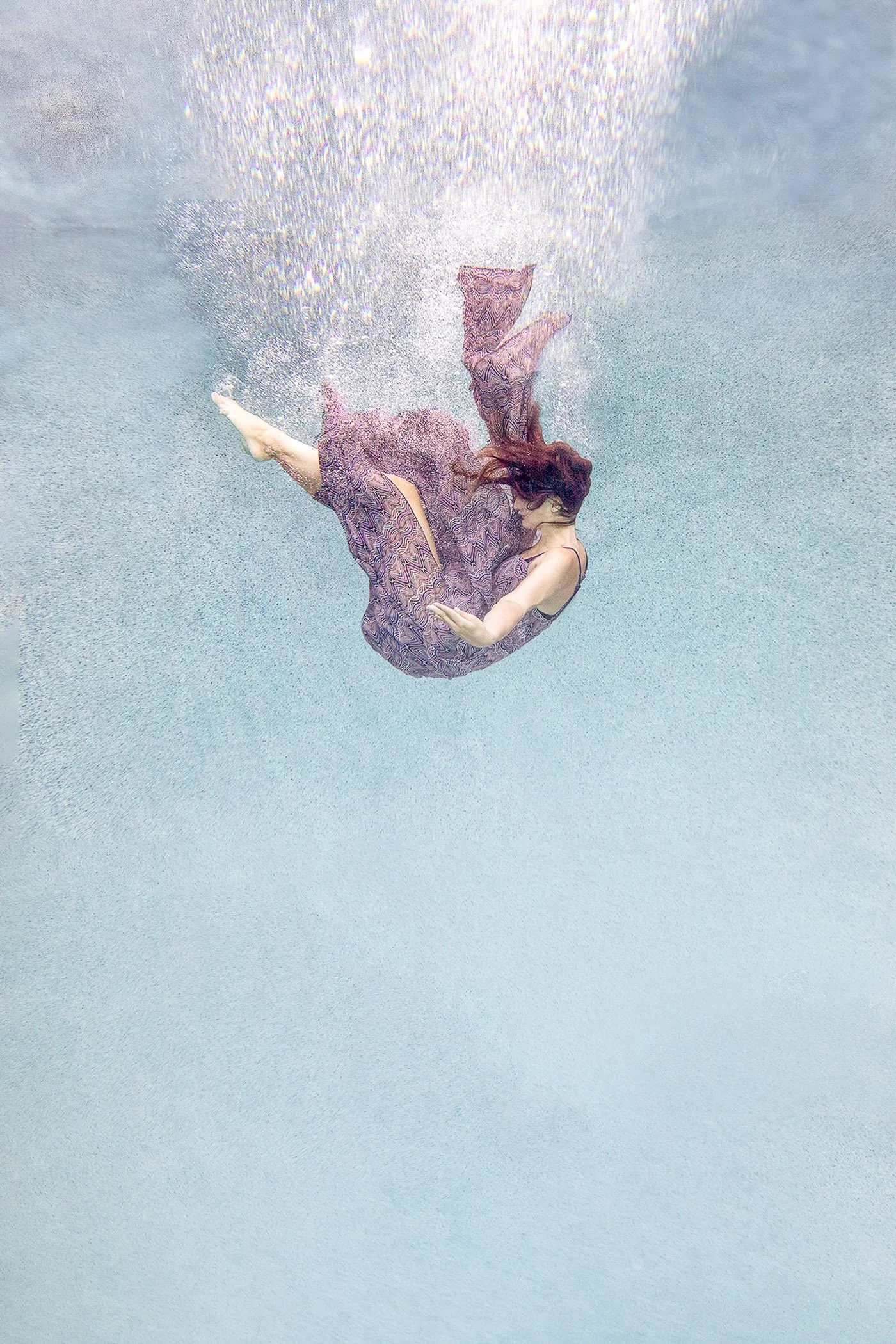fine-art-underwater-woman-letting-go.jpg