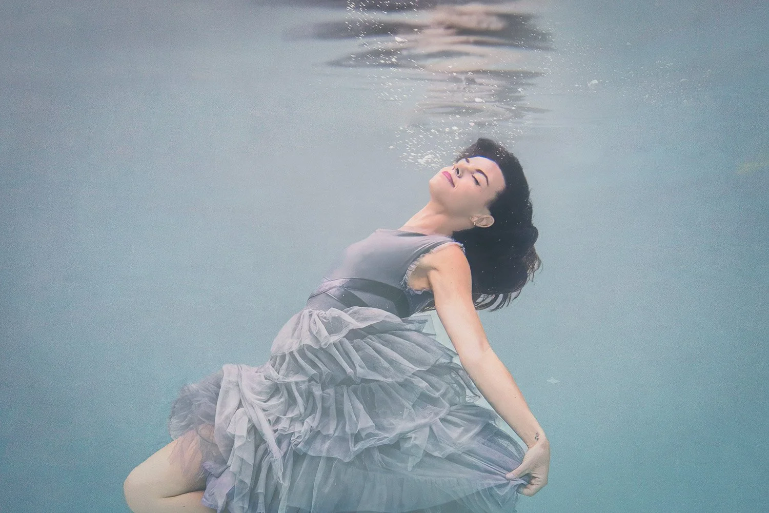 woman-underwater-blue-frilly-dress.jpg