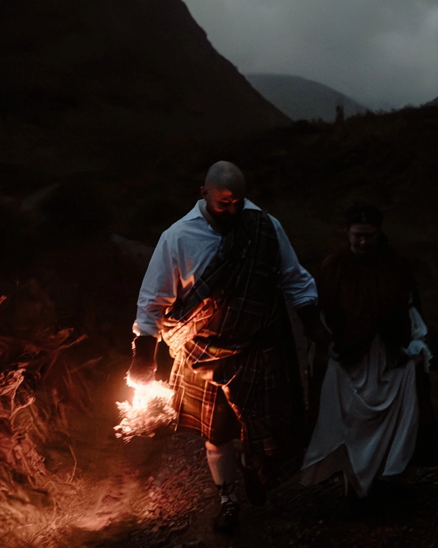 Vows at Sunrise ✨

Before the first light touched the hills, Marko&rsquo;s burning torch glowed softly against the darkness, its light weaving through the mist as he guided Casey through the Highlands. The stillness of dawn, the crunch of earth benea