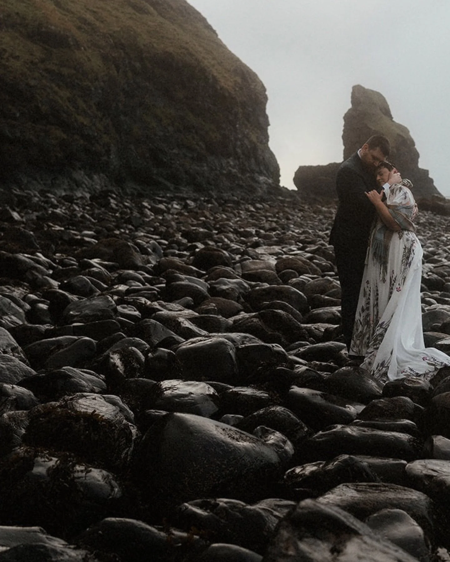 On the edge of the world ☁️

On the desolate shores of Skye, the wind whispered through the cliffs and the burns trickled softly through the glens. 

Wrapped in the quiet power of the landscape, Megan and Anthony exchanged their vows as the mist roll
