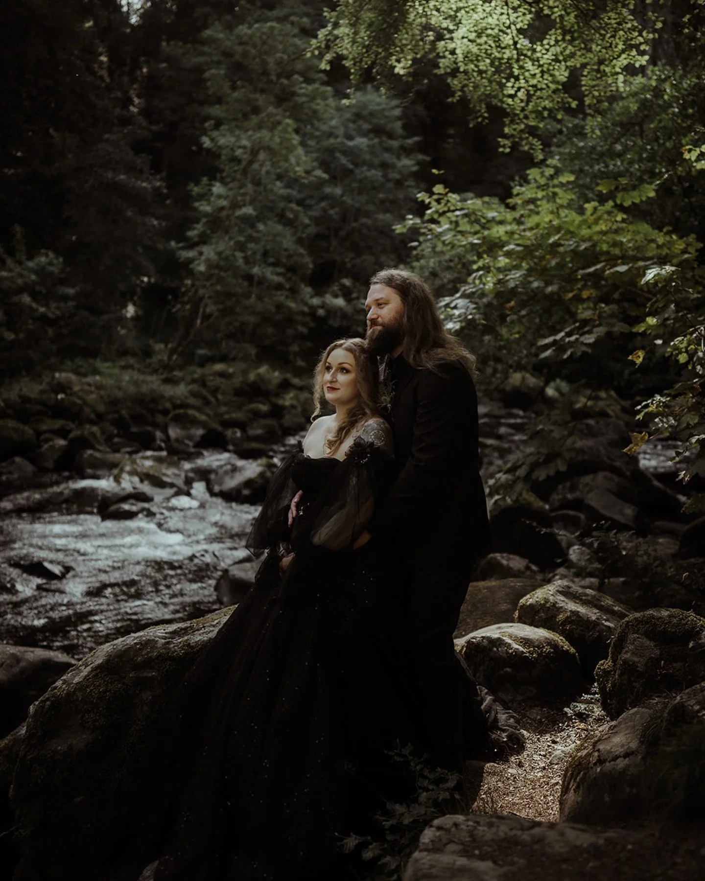 Melissa and Michael&rsquo;s elopement felt like stepping into another world. 🌿

Deep within the forest, beside rushing water and beneath towering trees, the day unfolded quietly. No grand ballroom. No white dress.

Just the two of them, wrapped in n