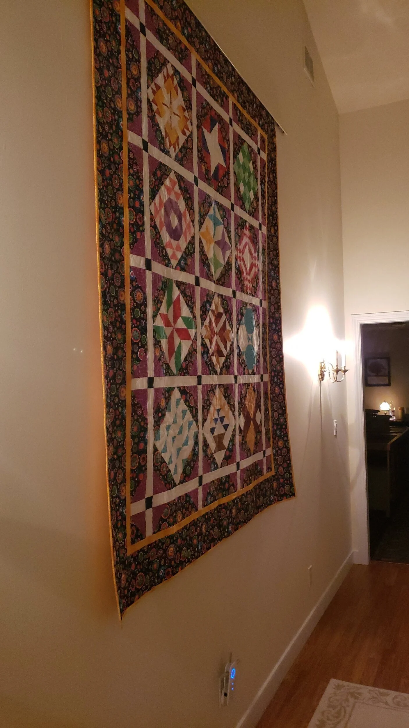 One of the many beautiful quilts on display here at the Seams Like Home Quilting Retreat slash B&B!