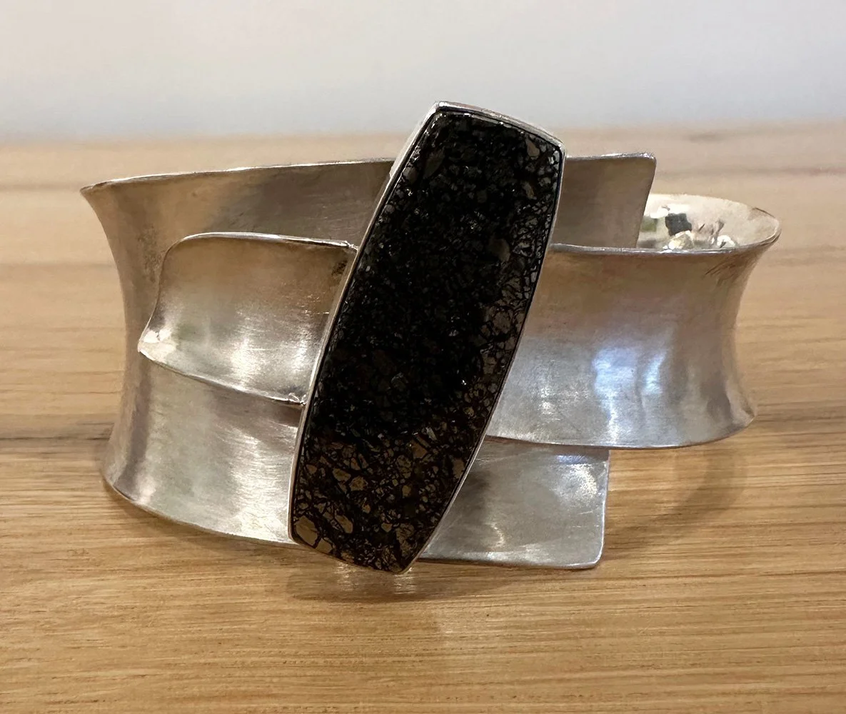 BDOD  Sue Mulvey Sterling and dinosaur bone cuff $650.jpeg