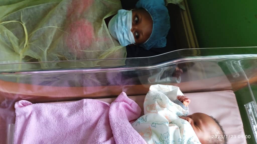 Women with the Baby Crib N2 .jpg