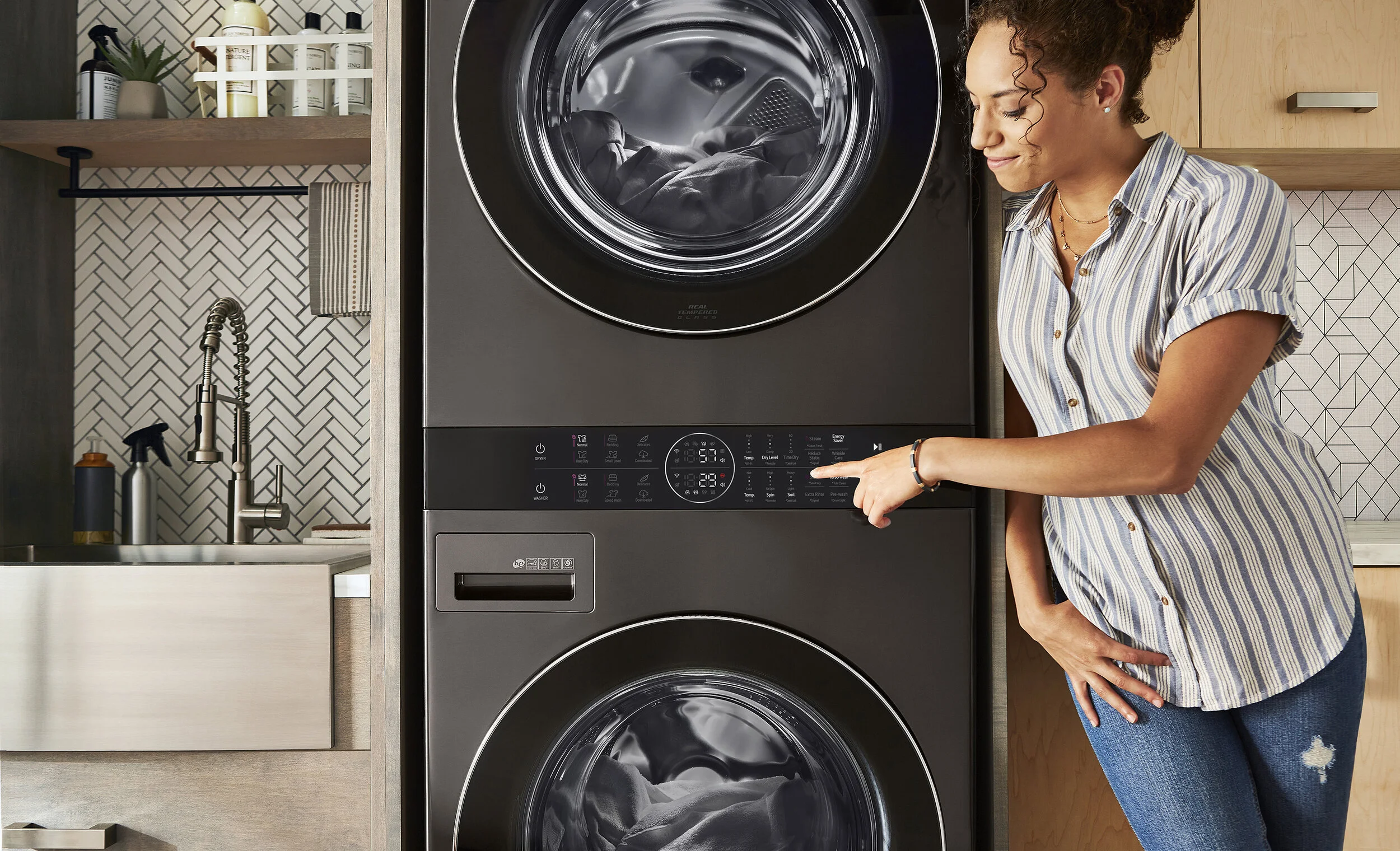  Director / Propping / Talent Selection / Wardrobe / Set Concept / Set Design / Retouching   Show real-life space-saving and ease-of-use applications of LG's WashTower™ in an aspirational, but every day, laundry room.    MY FAVORITE PART:  Who doesn