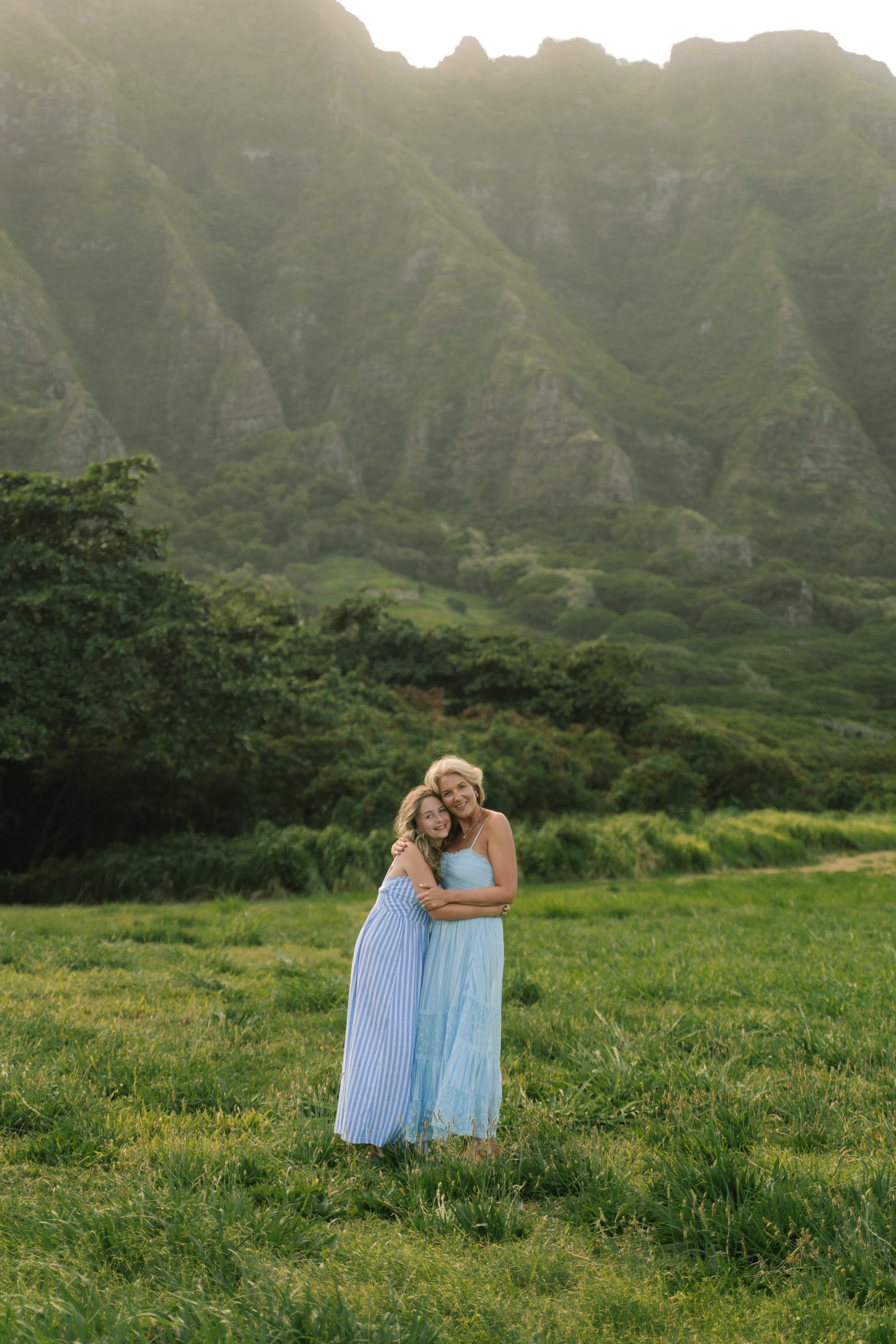 Natural family vacation photos during golden hour at Kahala Beach in Honolulu