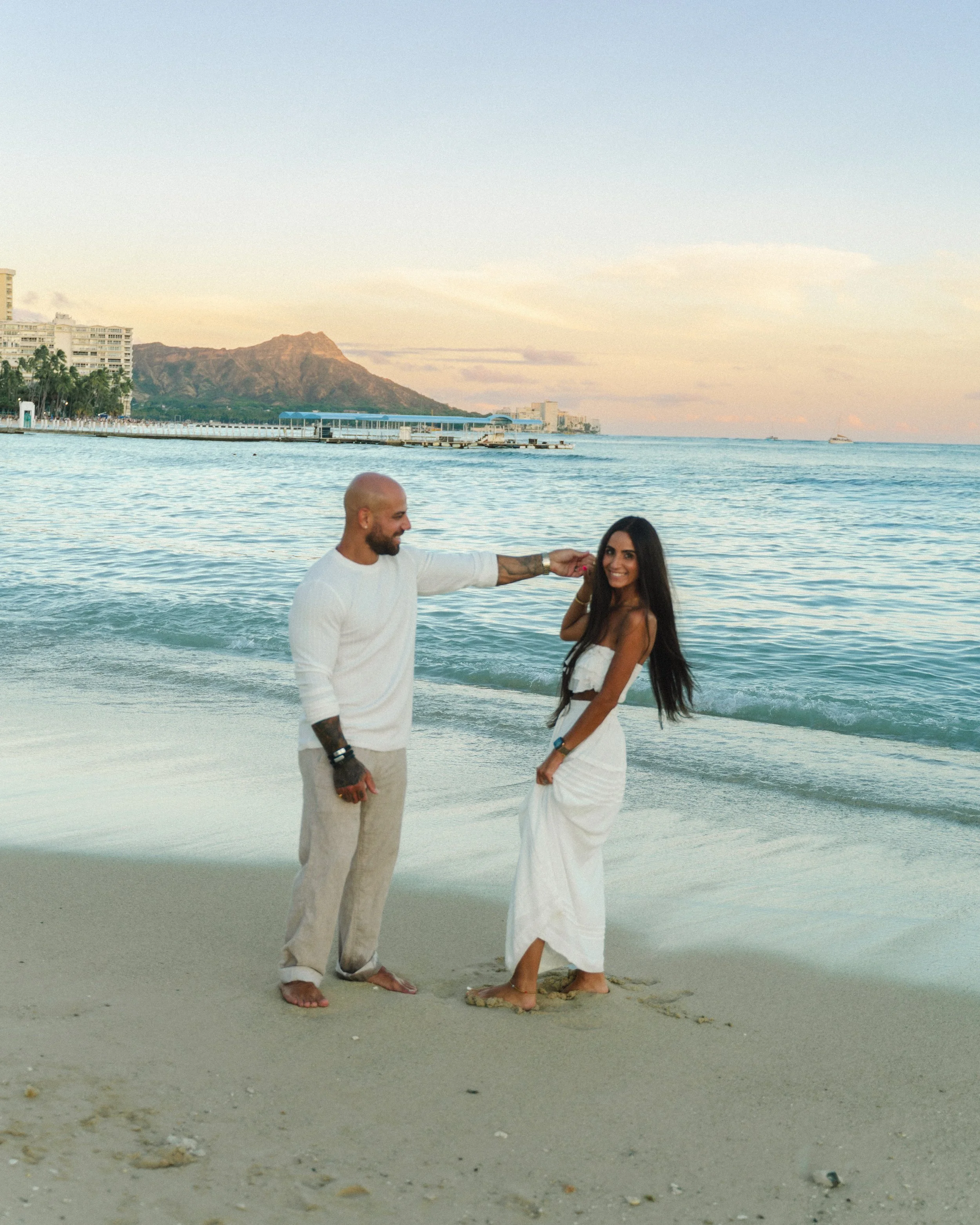 Oahu couple photography during golden hour on a Waikiki beach