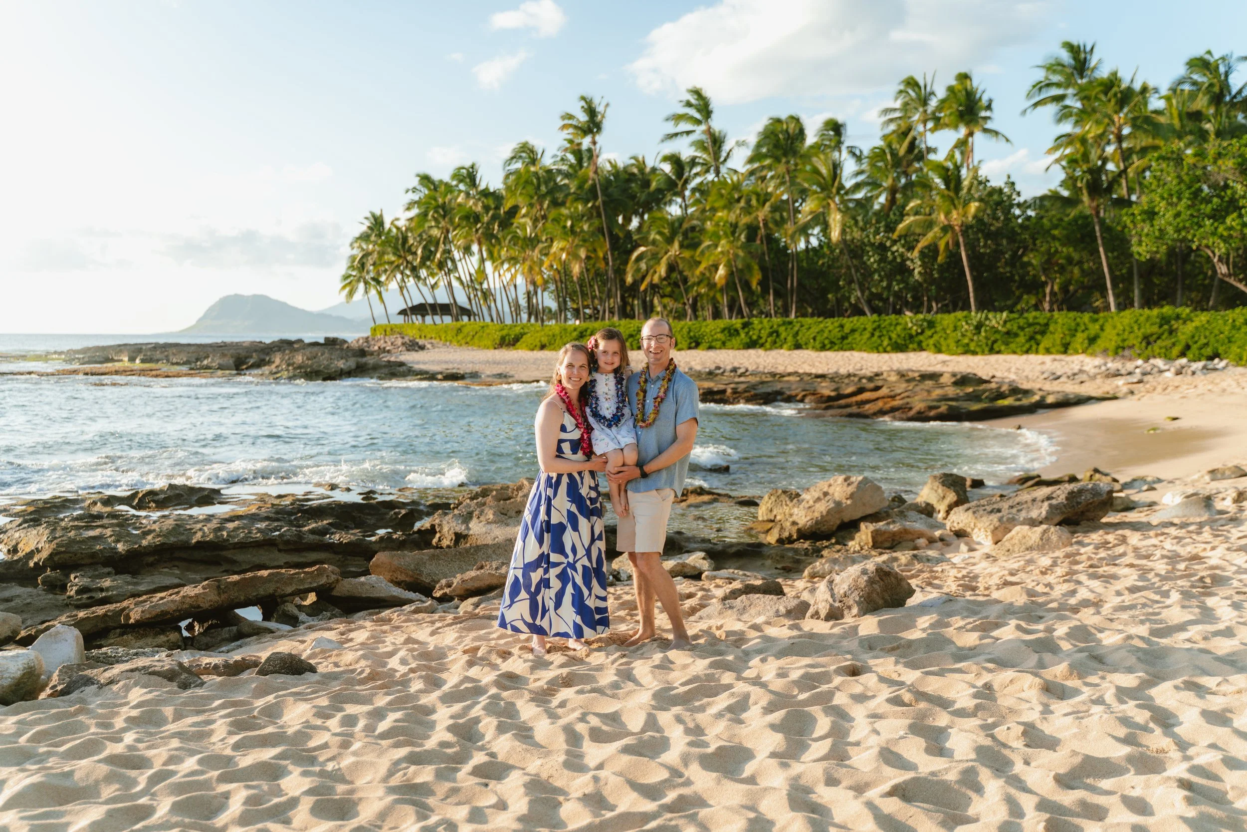 Family photos at Secret Beach in Ko Olina during sunset on Oahu.