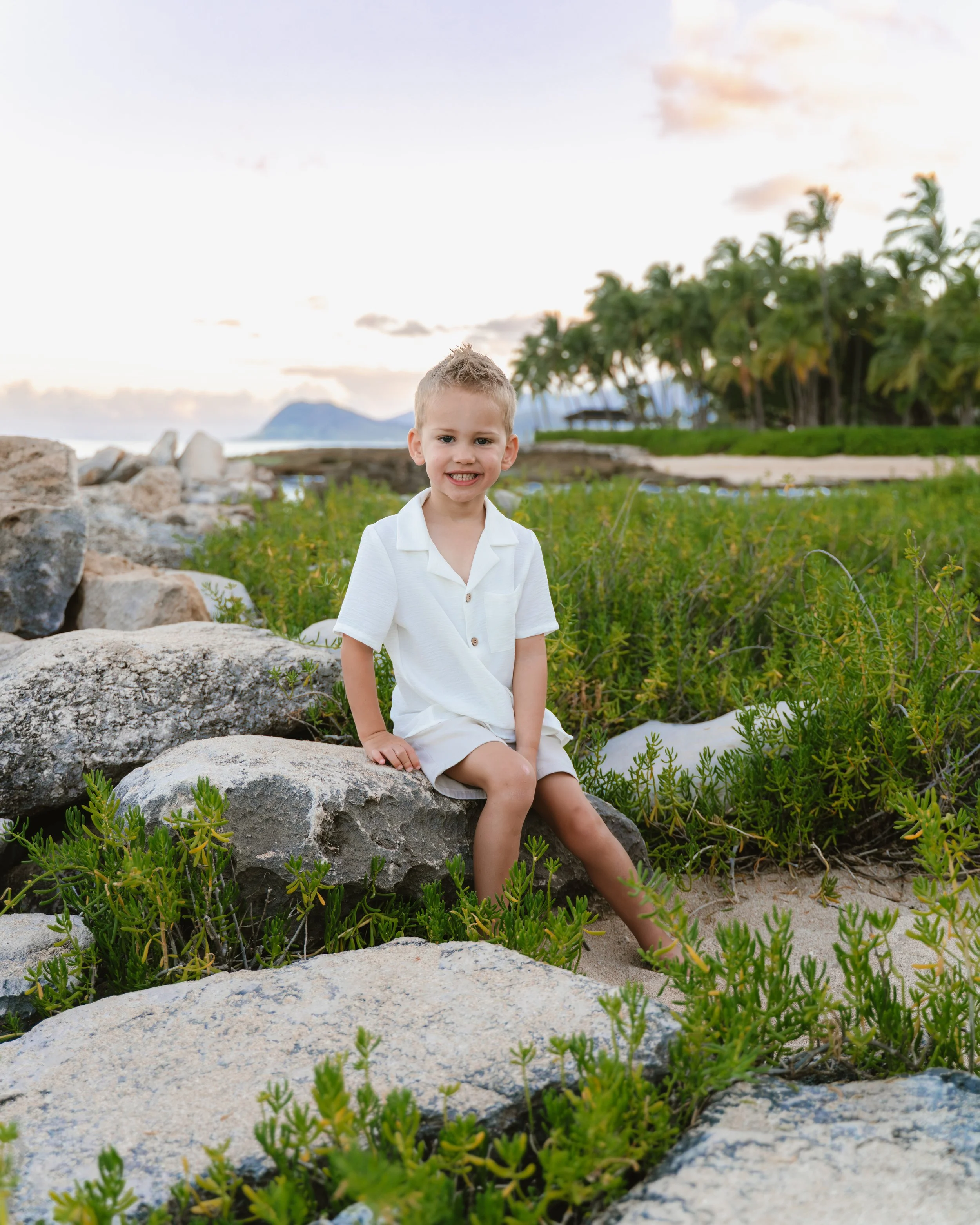 Sunset family photography session at Ko Olina Secret Beach Hawaii.