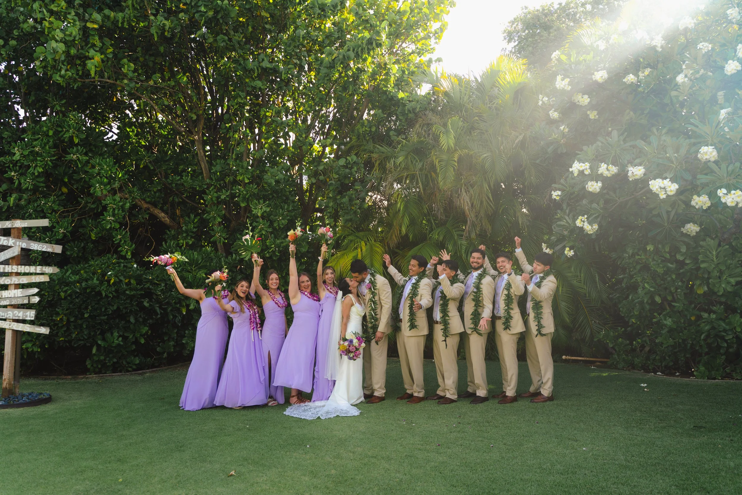 Full wedding party portrait at Kaimea Estates during an Oahu destination wedding