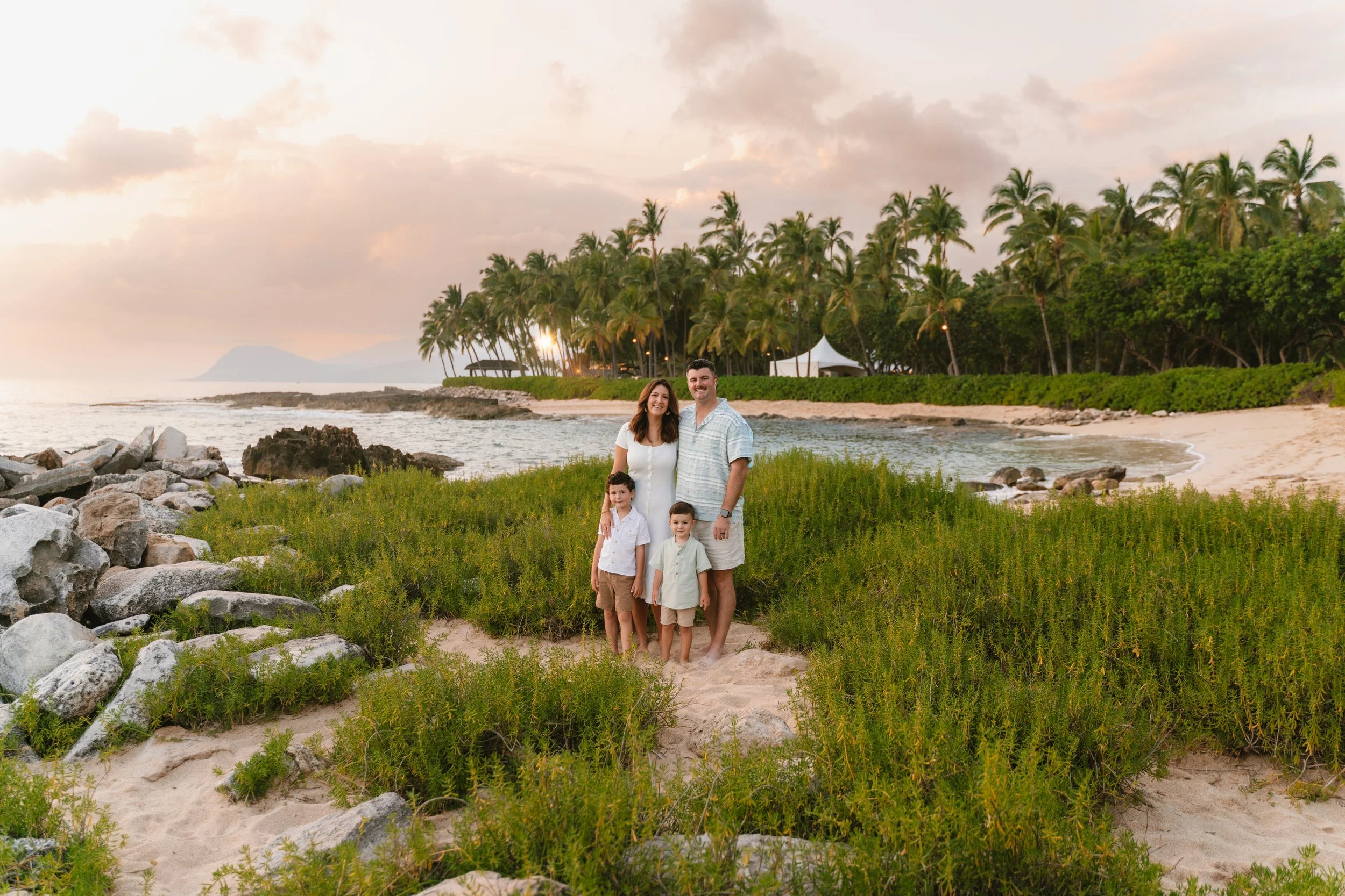 Sunset family photography session at Ko Olina Secret Beach Hawaii.