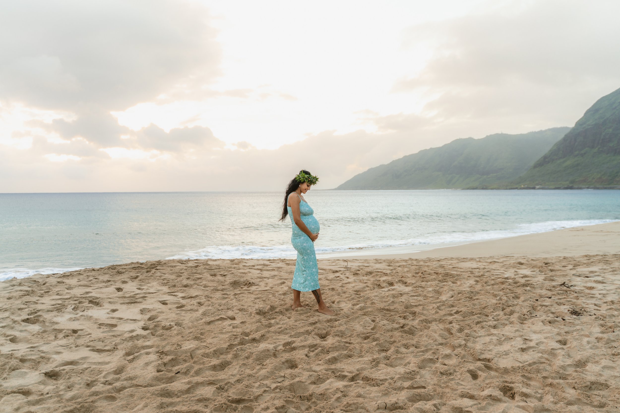Sunset maternity photography session at Makua Beach on Oahu.