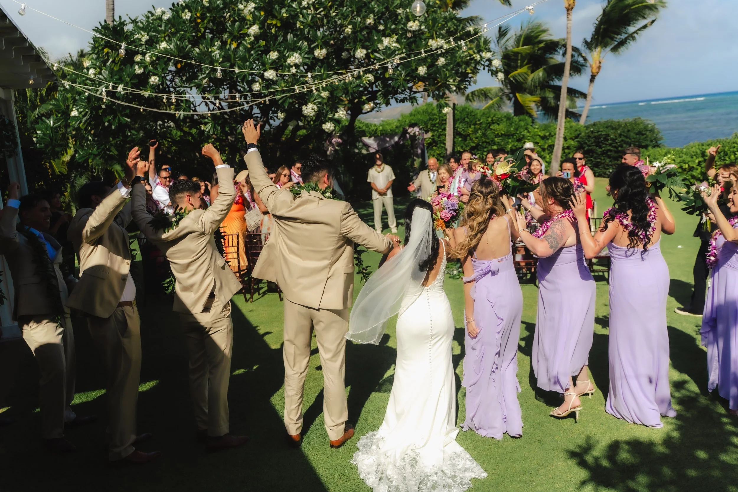 Outdoor wedding ceremony surrounded by tropical scenery at Kaimea Estates on Oahu