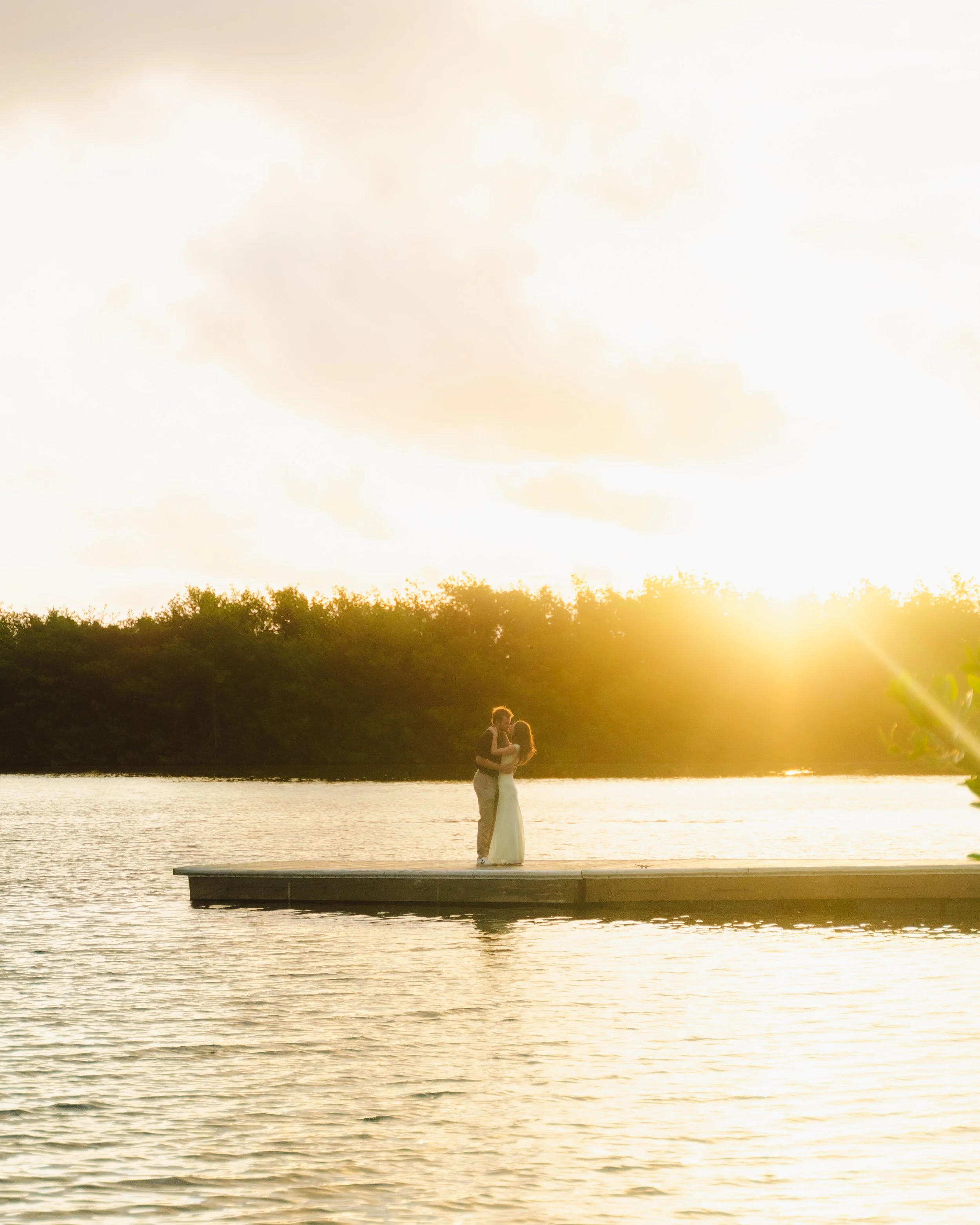 Emotional surprise proposal captured at sunrise at scenic Kualoa Regional Park on Oahu