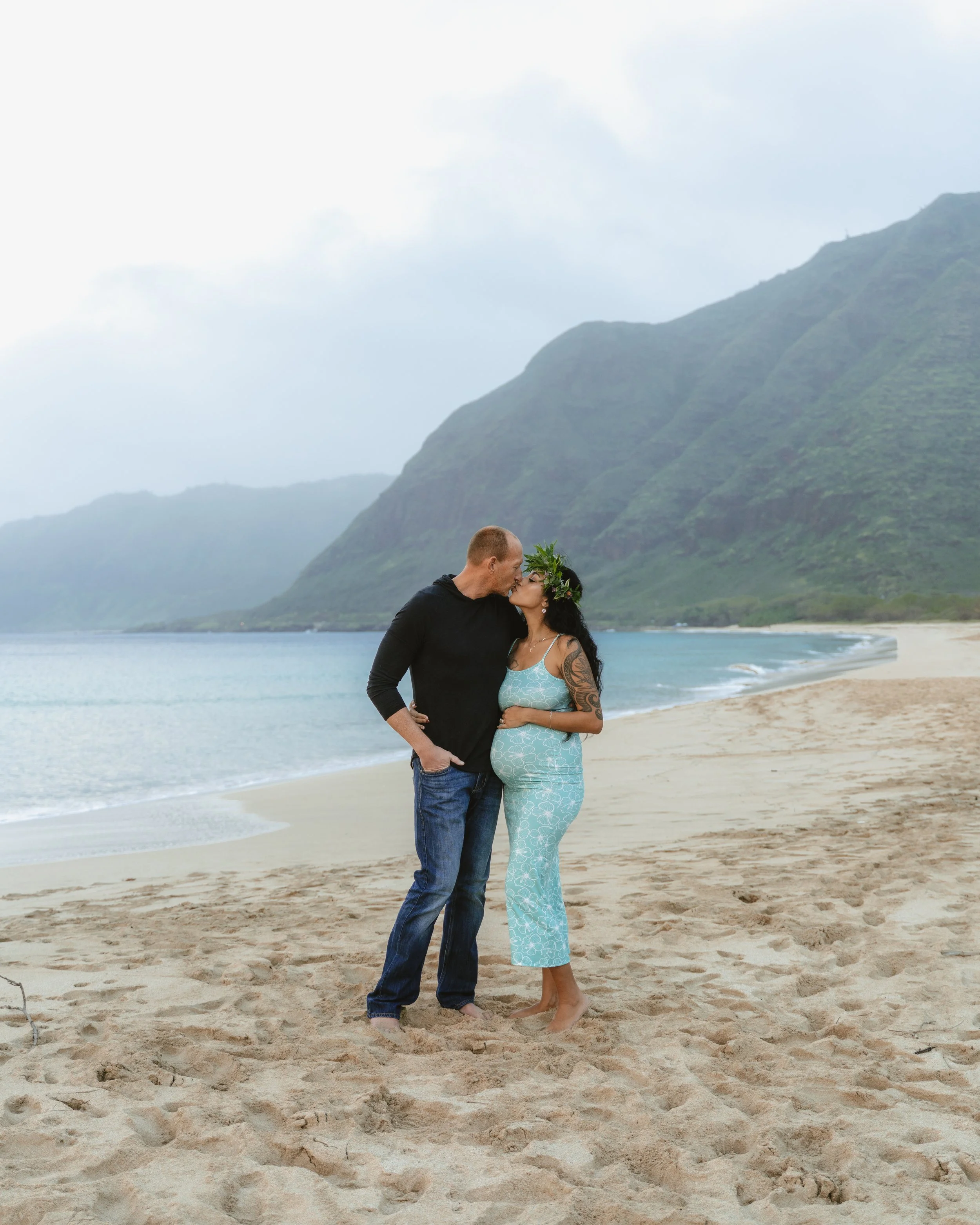 Sunset maternity photography session at Makua Beach on Oahu.