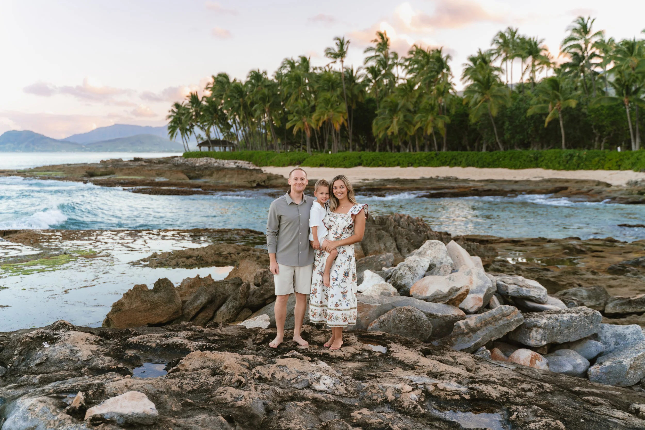 Family photography session at Secret Beach in Ko Olina during sunset.