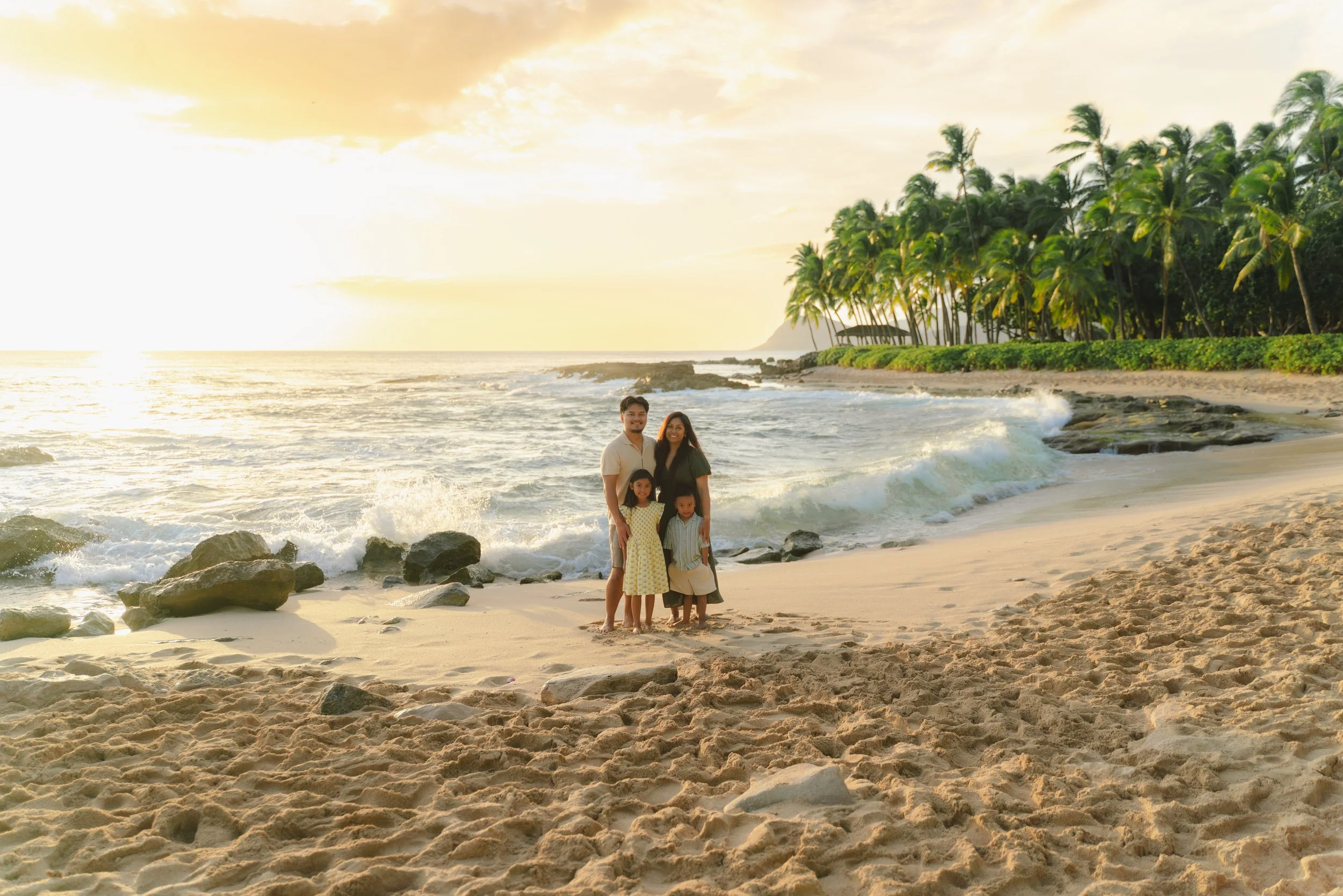 Family vacation photos captured at Secret Beach near the Ko Olina resorts on Oahu Hawaii