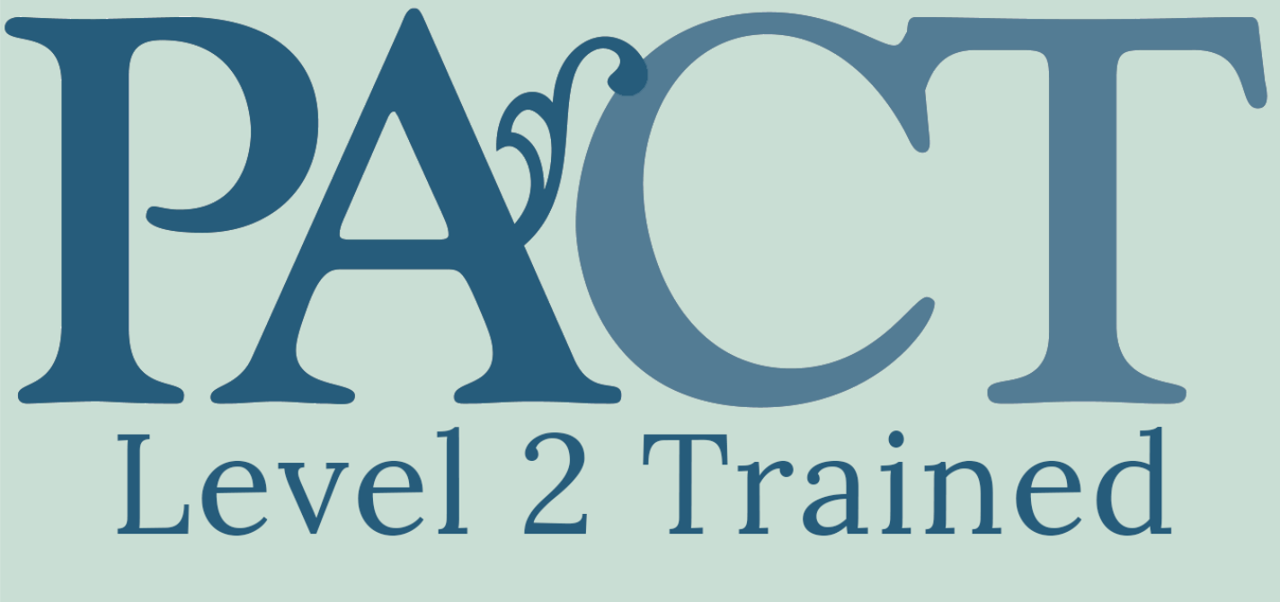Logo with large blue letters spelling 'PACT' and smaller text below reading 'Level 2 Trained' on a light green background.