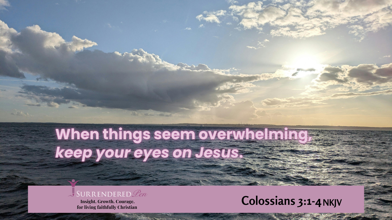 Image of the sea with a cloudy sky and light shining through. Words on topi of it say when things seem overwhelming, keep your eyes on Jesus. Also the logo and scripture on it from Colossian 3:1-4