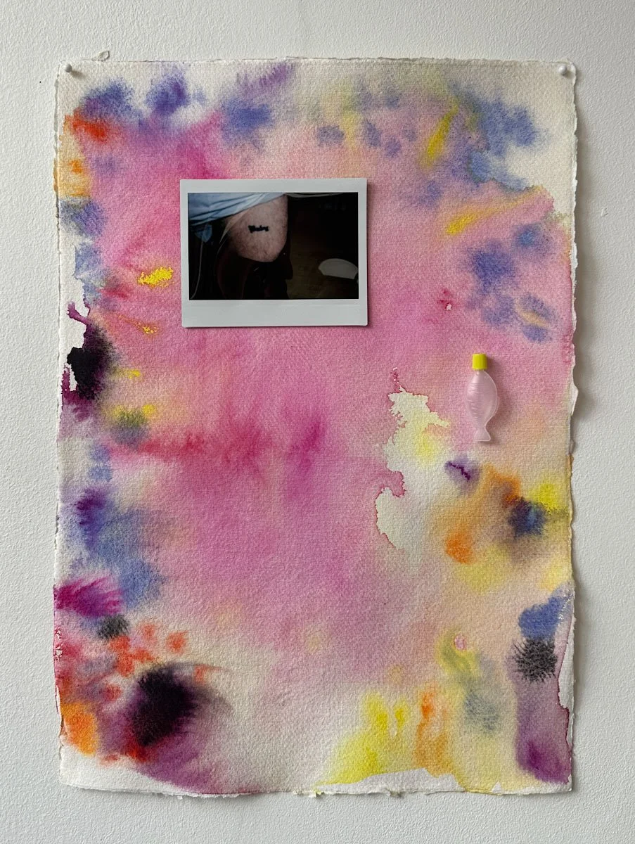 "Baby," watercolor, plastic fish-shaped container, and polaroid on paper, 16.5 x 11.7 inches, 2024