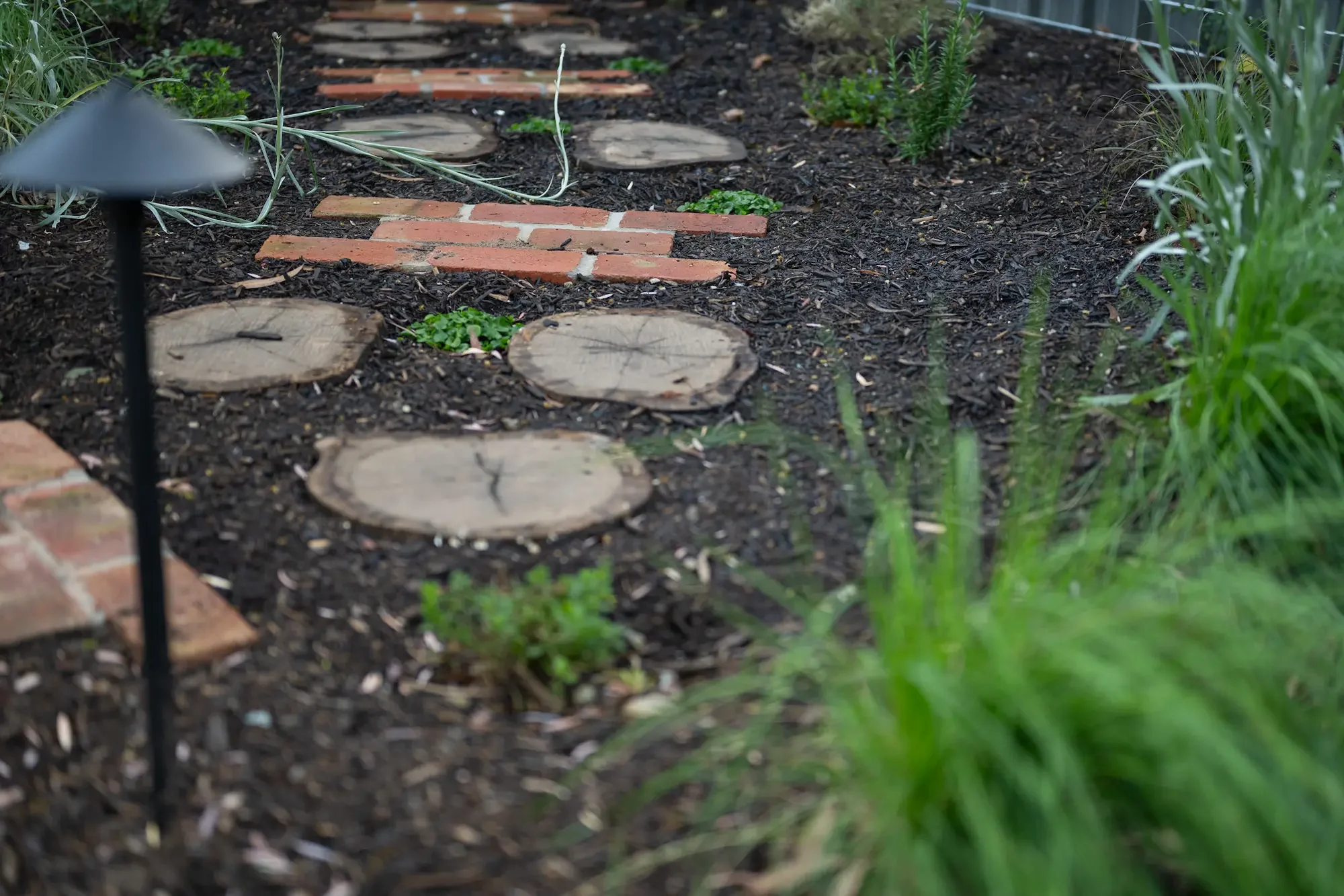 Round-log stepping stones brick path 