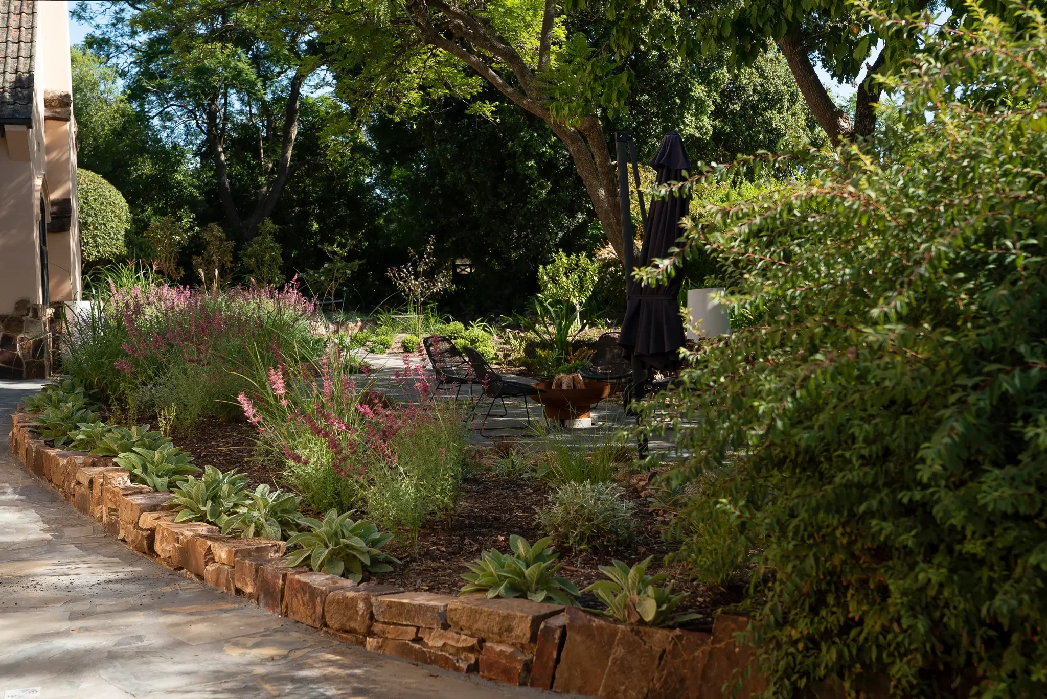 Restored drystone wall and fire pit