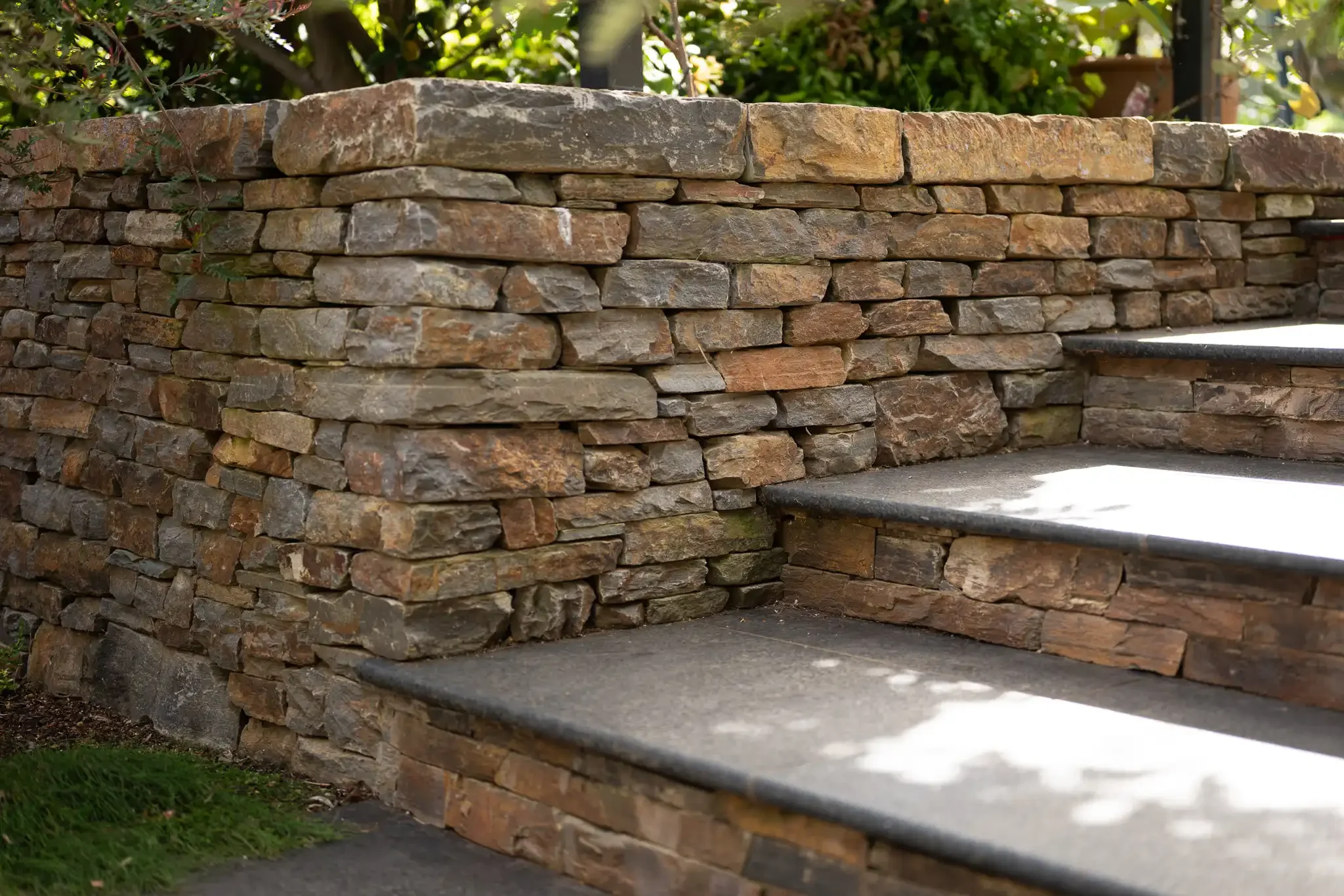 Wistow bluestone walling granite paving