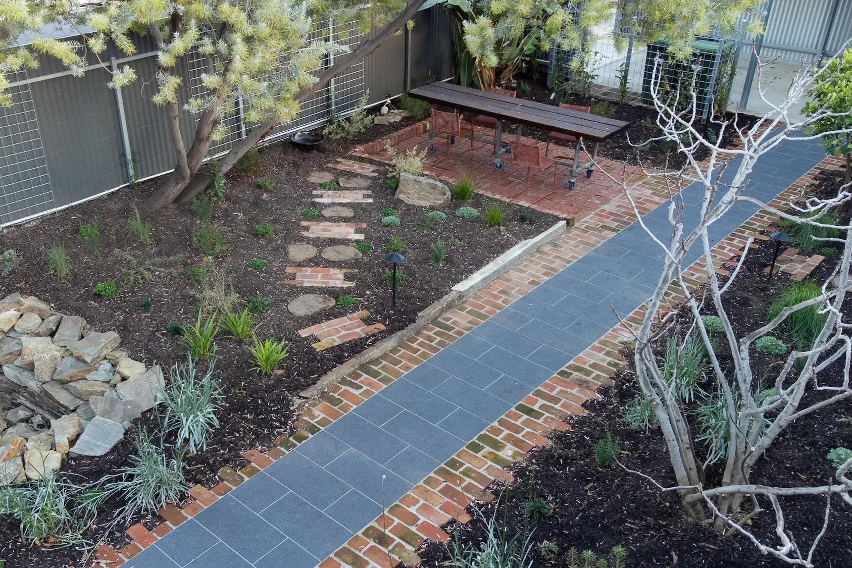 Aerial view of a wildlife and sustainable garden design with reclaimed bricks and reused bluestone