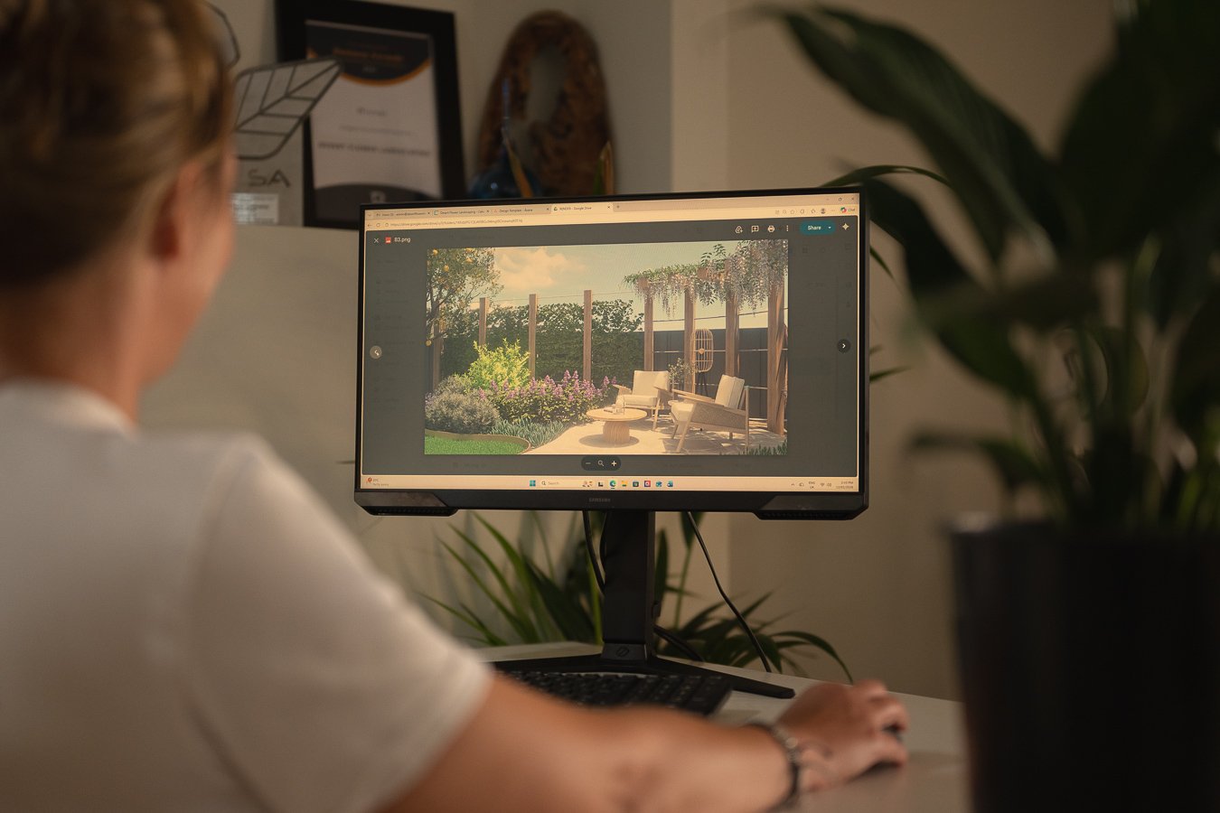 Desert Flower Landscaping designer checking through 3d renders of a garden design project