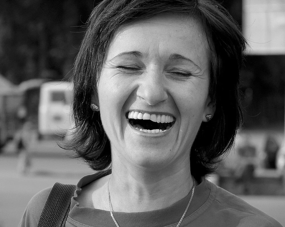 WHY DO WE LAUGH?