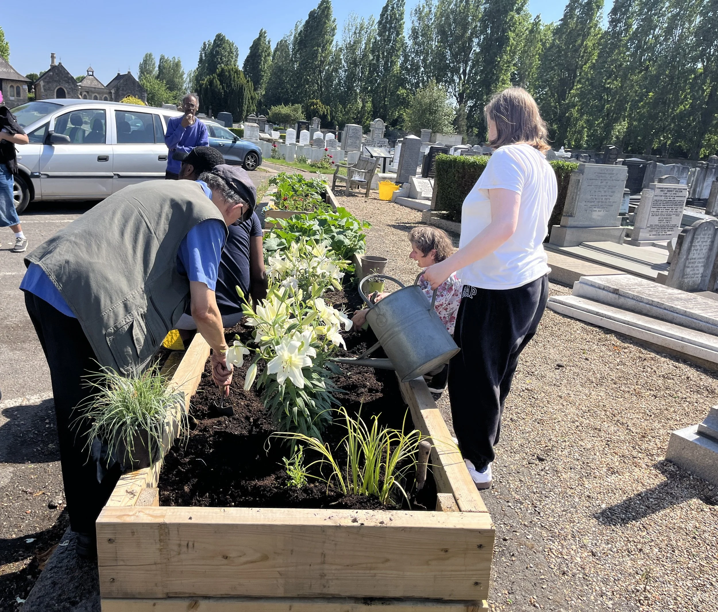 Brent Mencap planting the containers, 27 May 2026