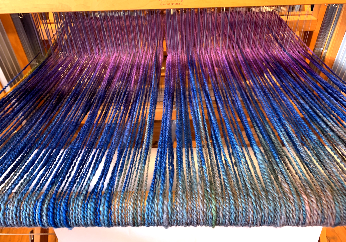 A weaving loom that is warped