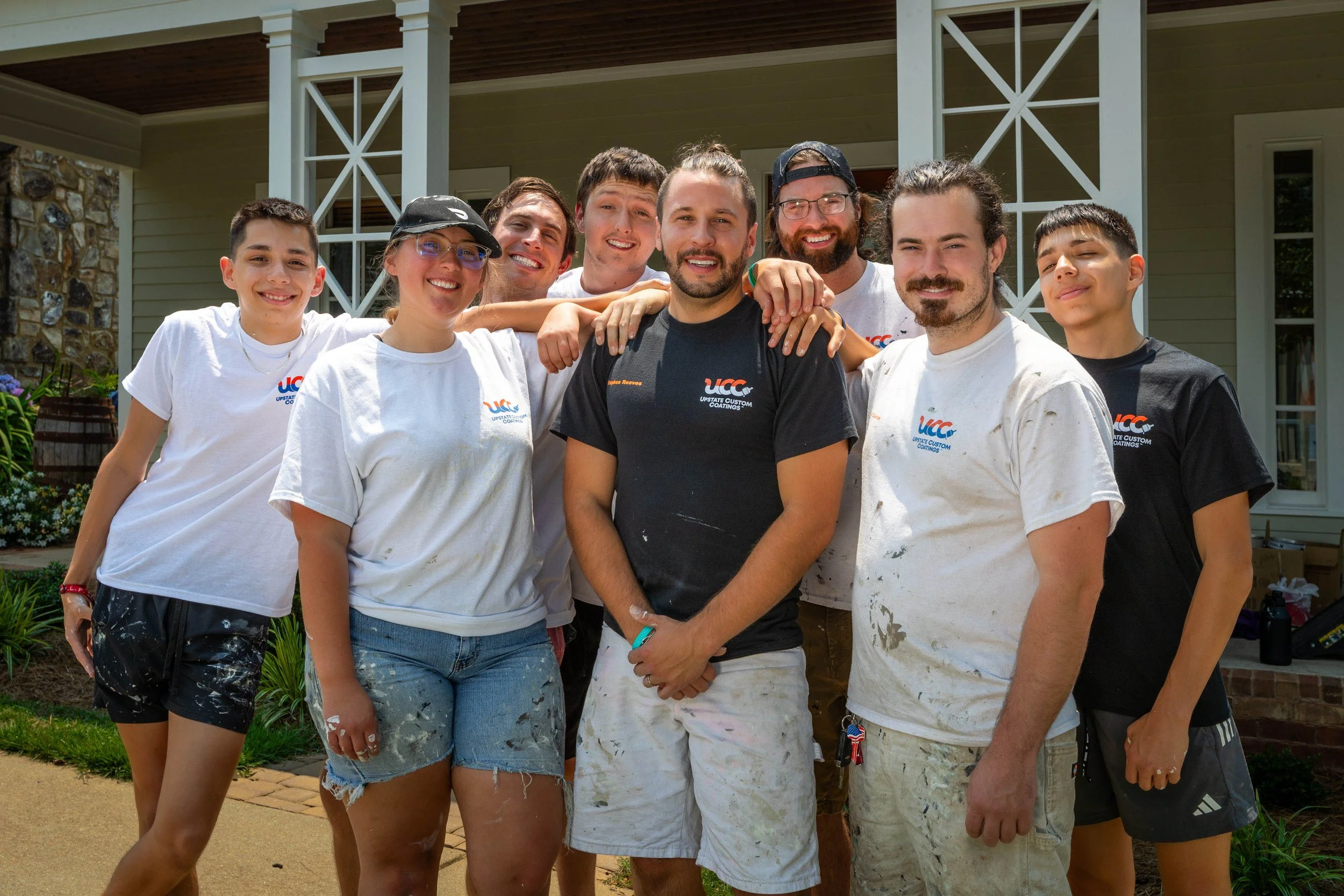 Upstate Custom Coatings residential painting team outside project home in Greenville, South Carolina — home services and team photography by Weaver Media