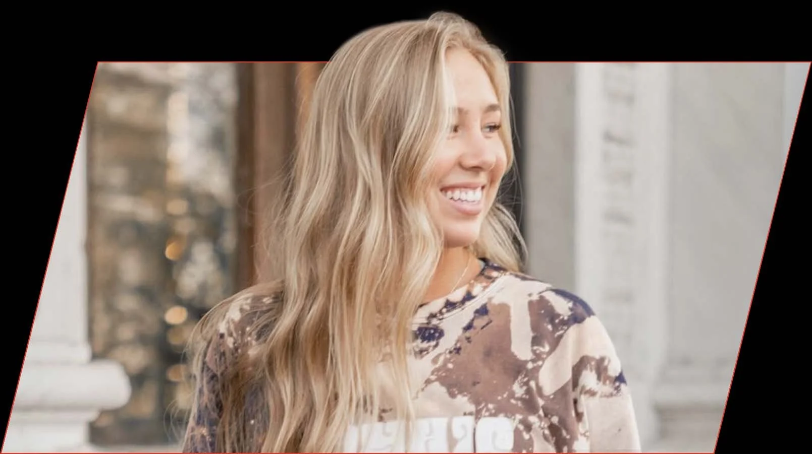 Testimonial portrait of Natalie W smiling in a her testimonial image