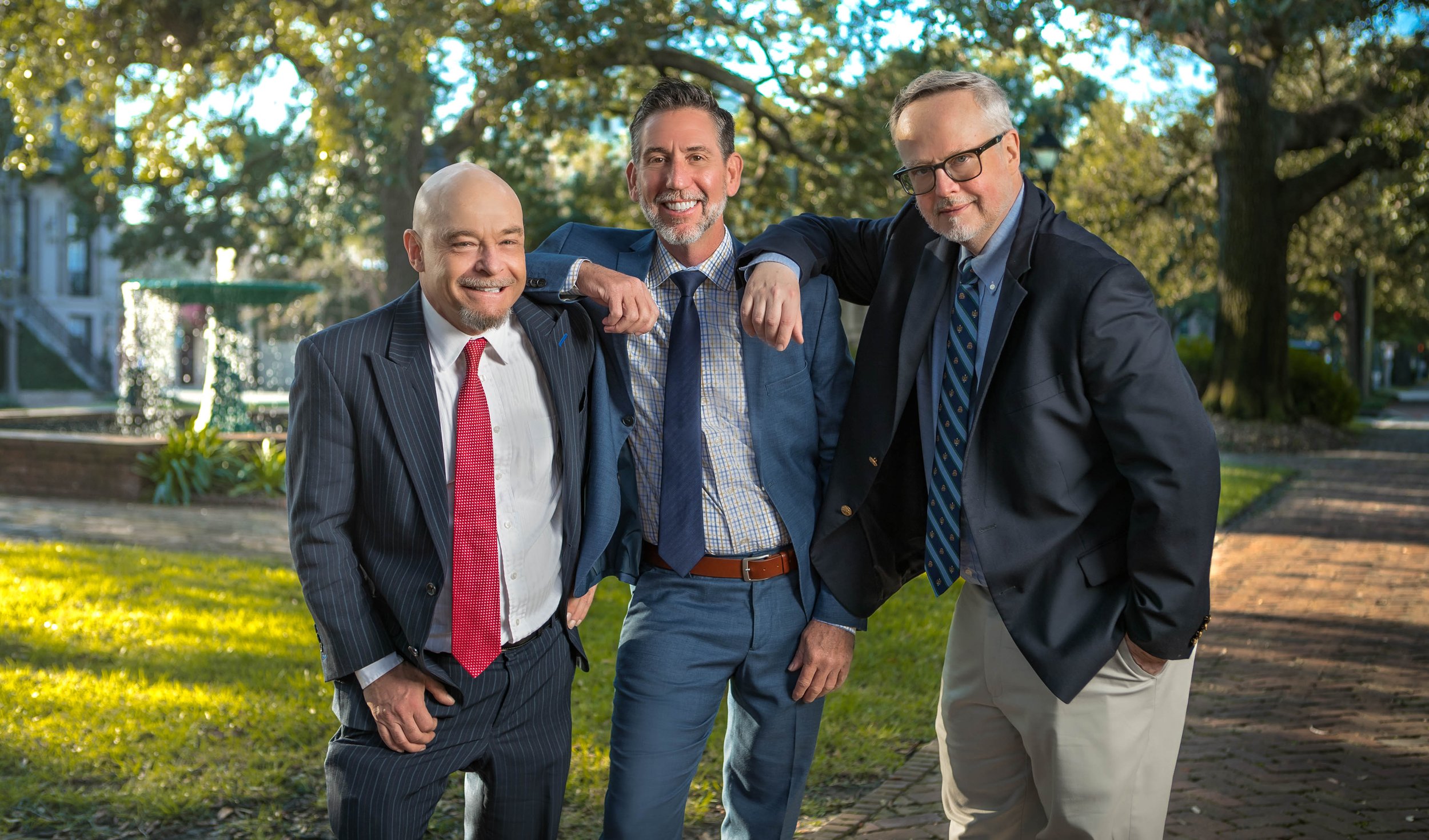 Partners from Thomerson Jones & Edwards P.C. law firm standing in historic Columbia Square in Savannah, Georgia — professional brand photography
