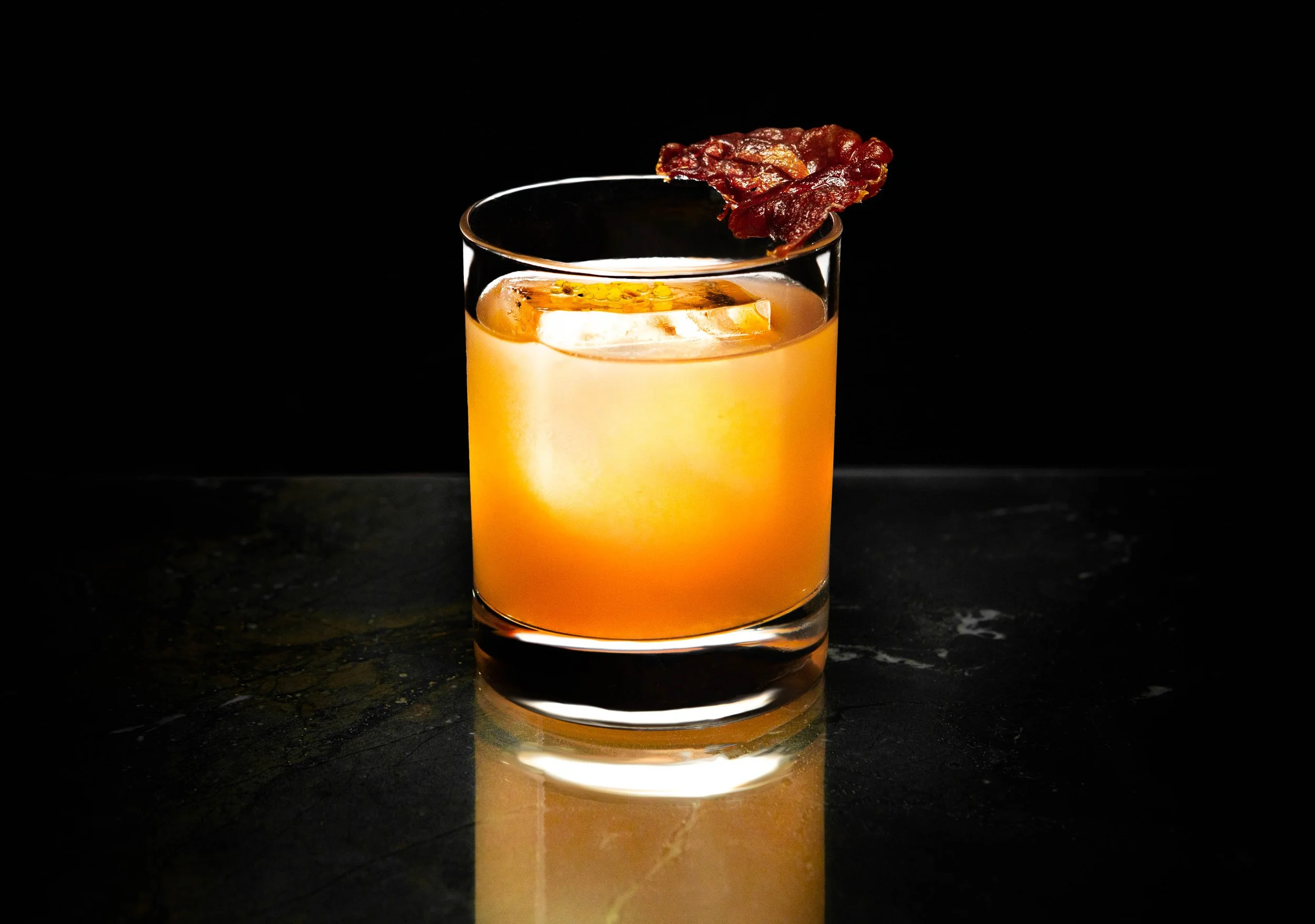 Craft cocktail with a garnish served at Curean Mediterranean restaurant in Greenville, SC — gourmet photography by Weaver Media