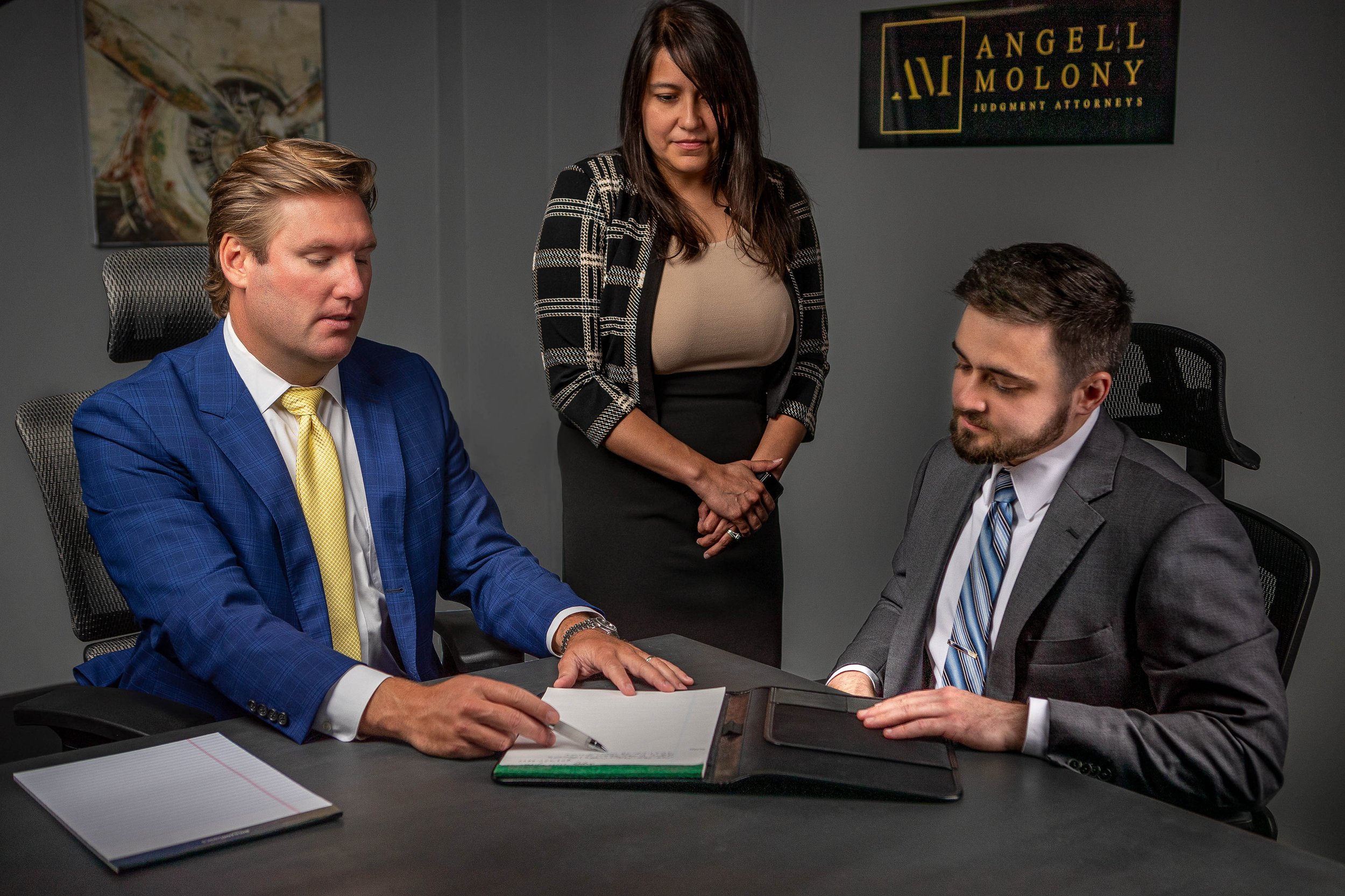 Attorneys/employees of Angell Molony in an upscale office in downtown Greenville, SC — professional law firm and corporate photography by Weaver Media