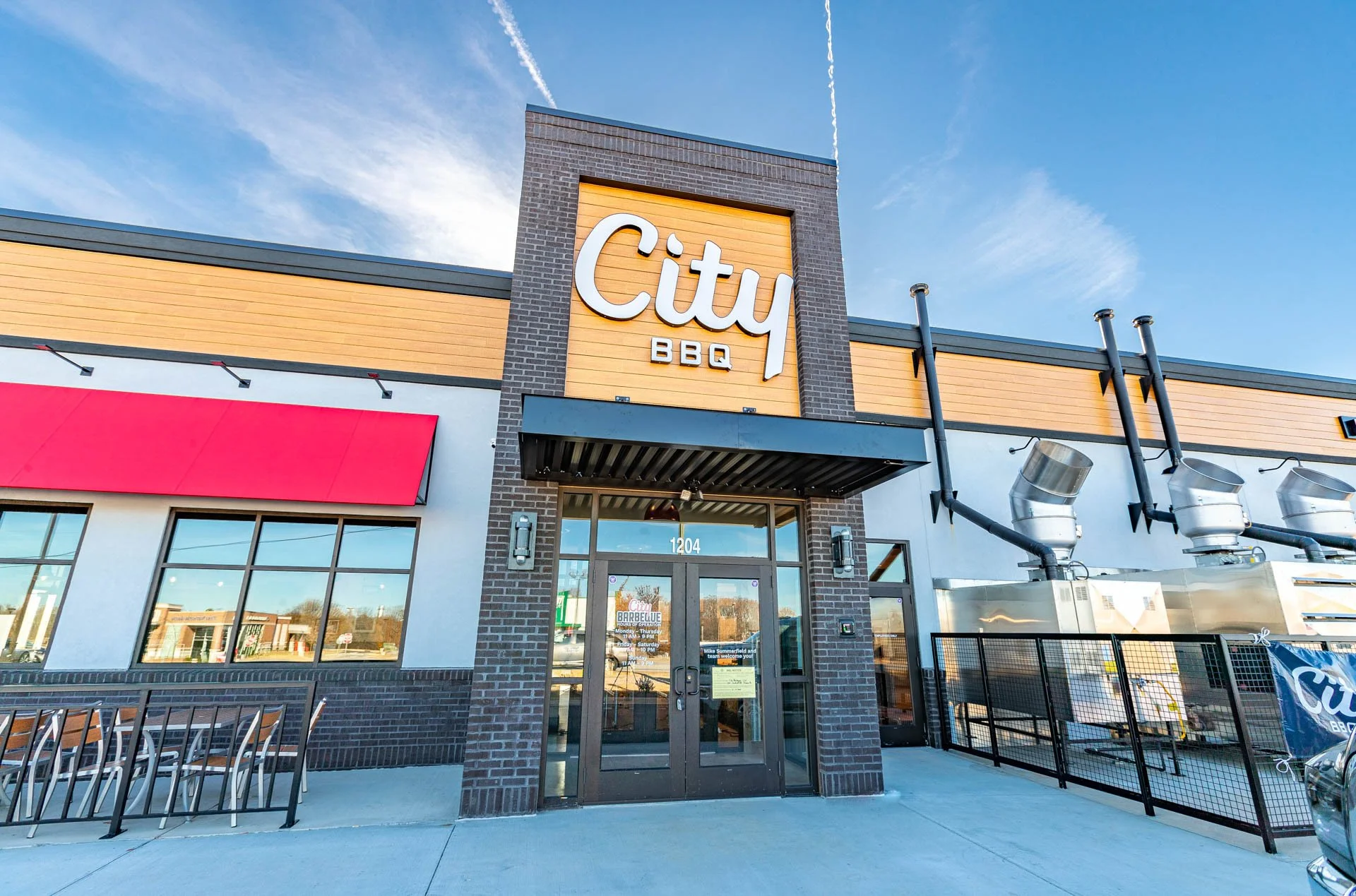 City BBQ restaurant exterior in Greenville, South Carolina — commercial restaurant photography for brand marketing by Weaver Media