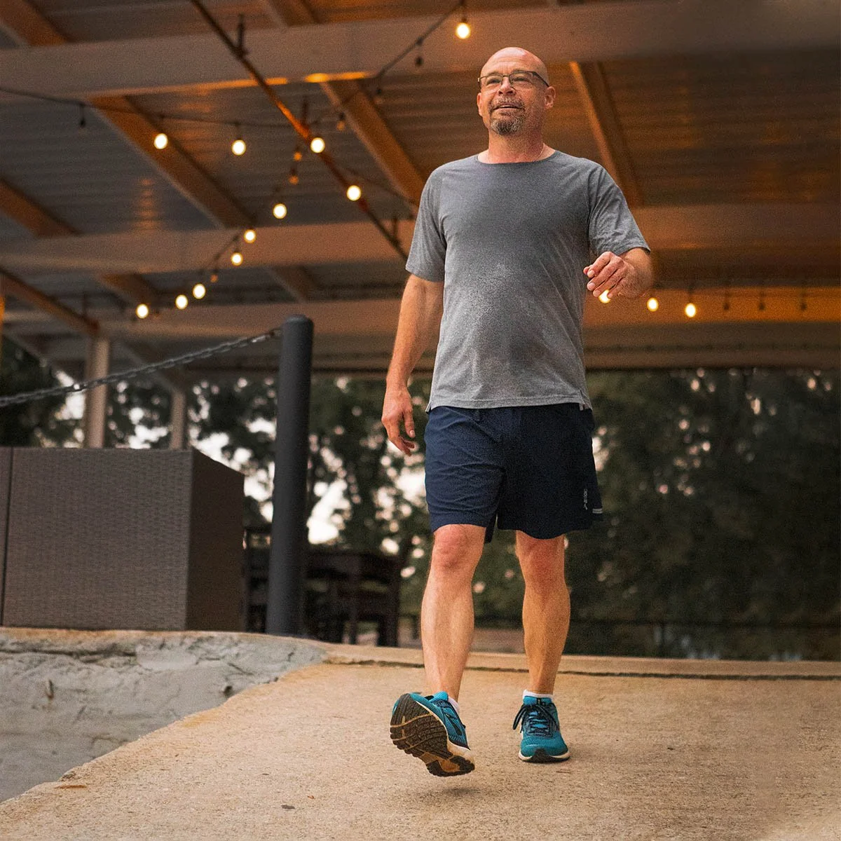 Michael Thomerson, managing attorney of Thomerson Jones & Edwards P.C. cooling off after a run on the Swamp Rabbit Trail — lifestyle brand storytelling photography by Weaver Media.