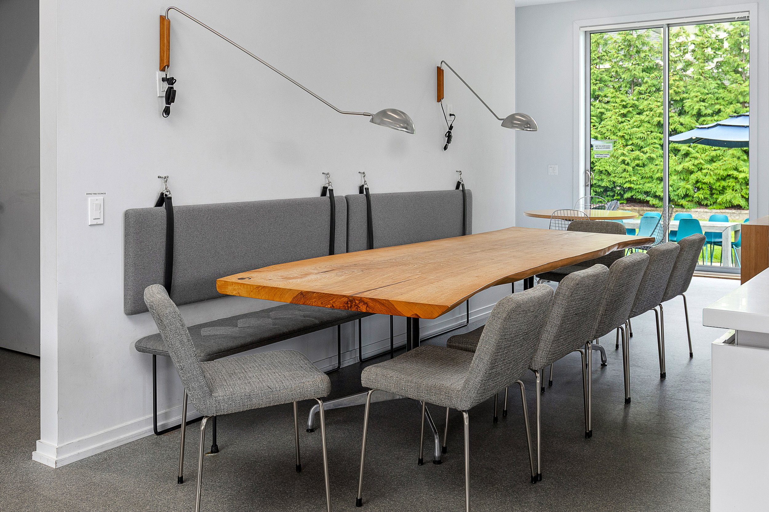 "Live edge" dining table, with seating for 13.  There is additional seating for four more in the adjacent nook