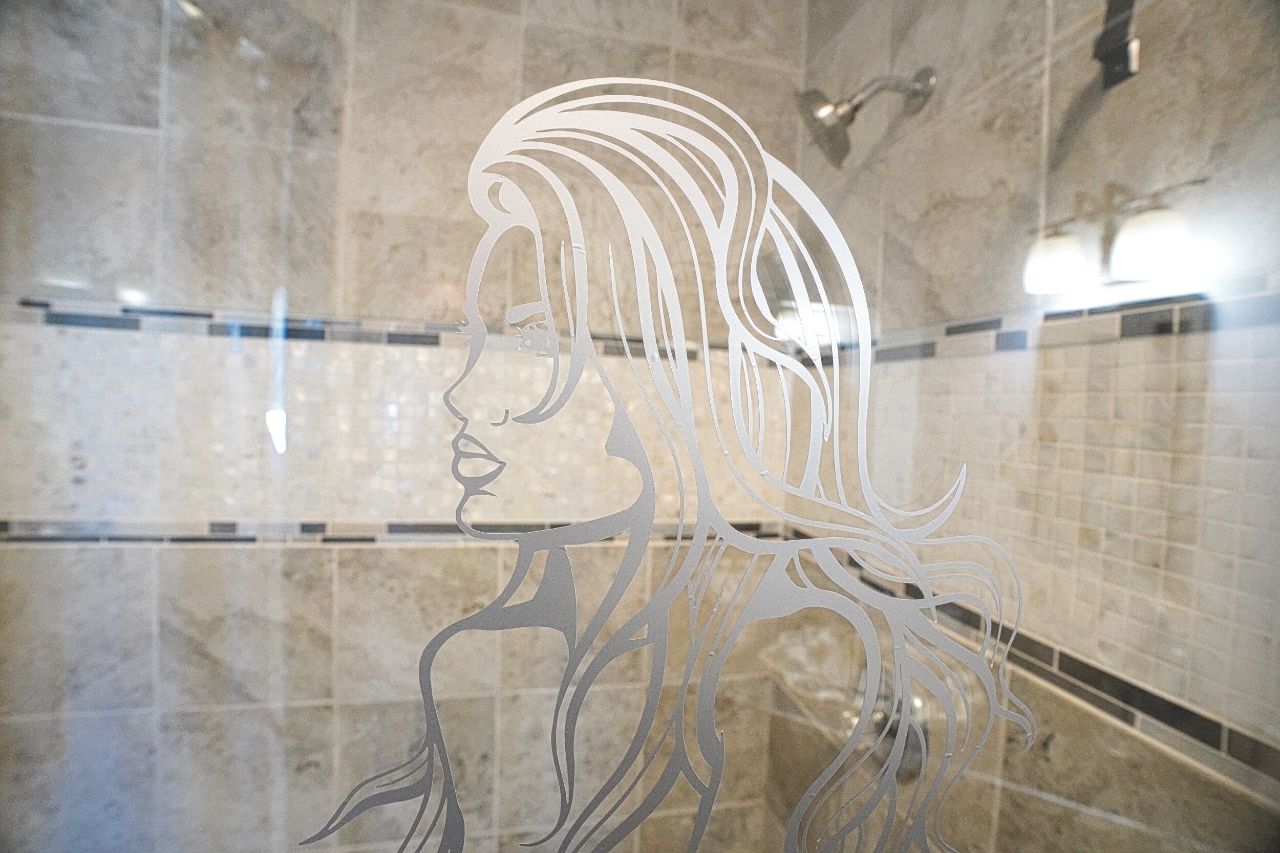 signature mermaid on the glass.jpg