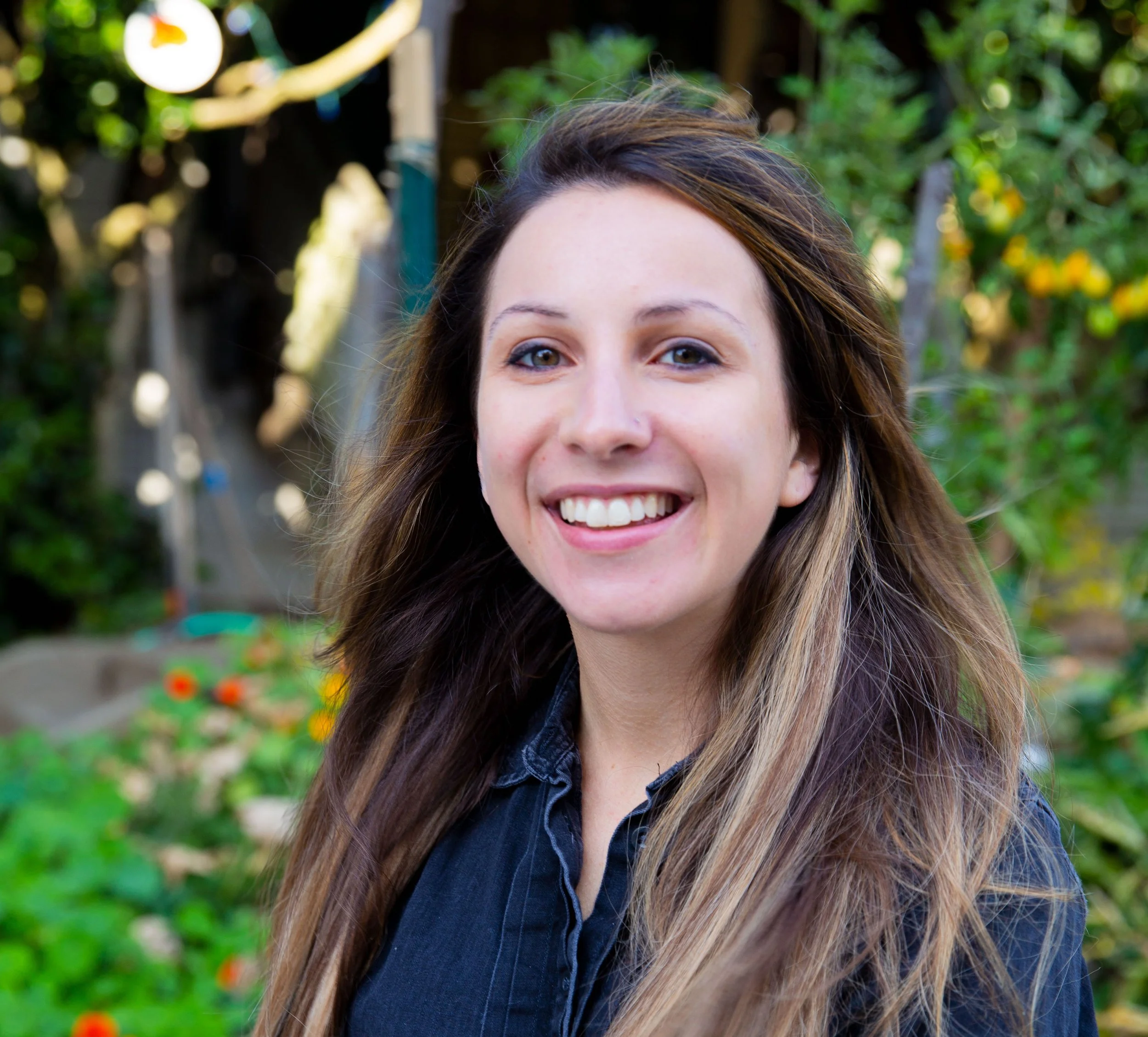 Allie Sivak food writer, editor, and communications strategist smiling for a picture