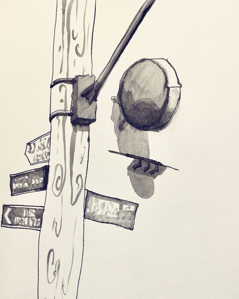 Street Signs on the Corner of Napier and Johnston Streets in Fitzroy, Melbourne, sketched with brush and ink. © Simon O'Carrigan, 2022.