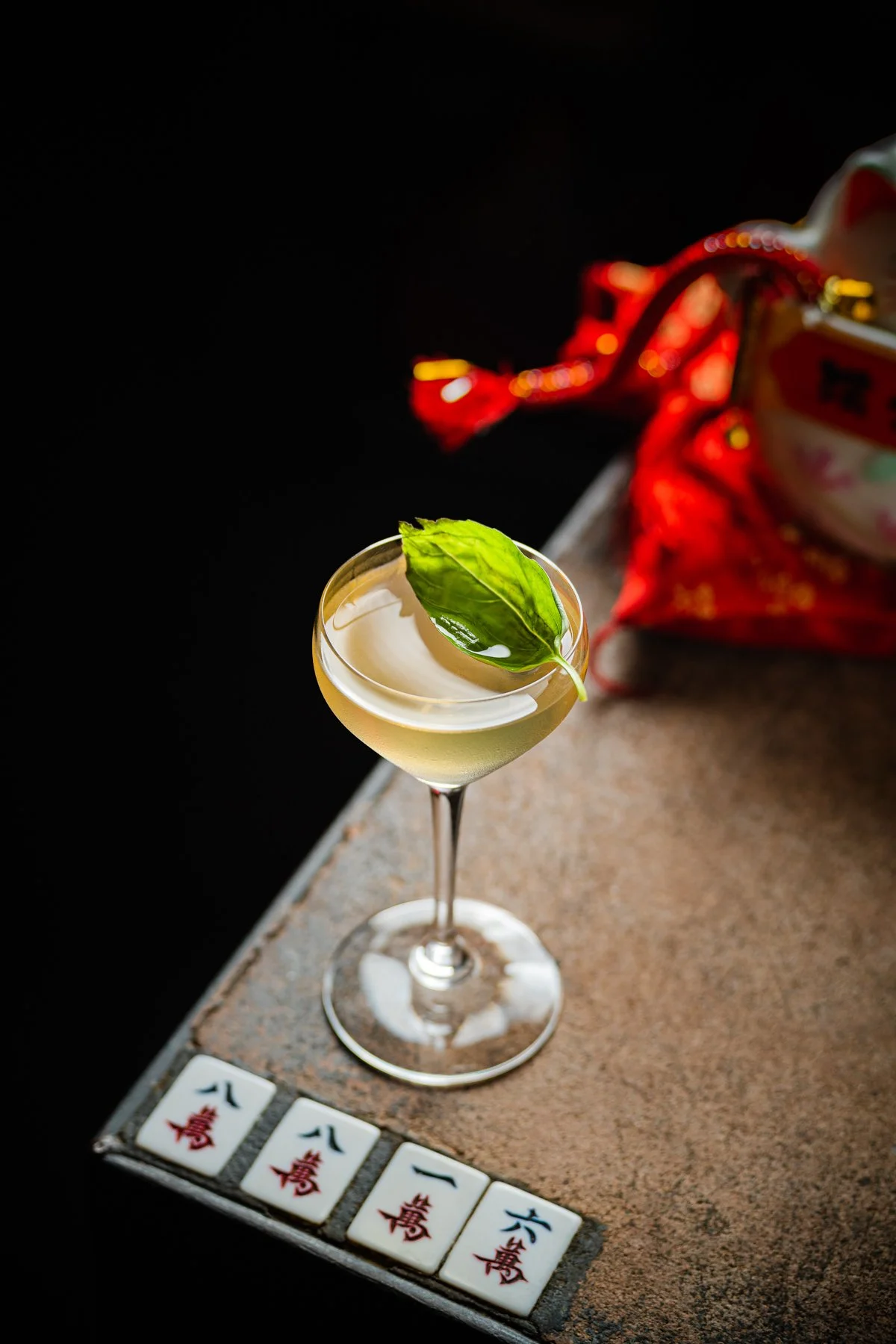 Elegant looking cocktail with Chinese decorations, photographed and staged by Leeds Food Photographer photoJMO