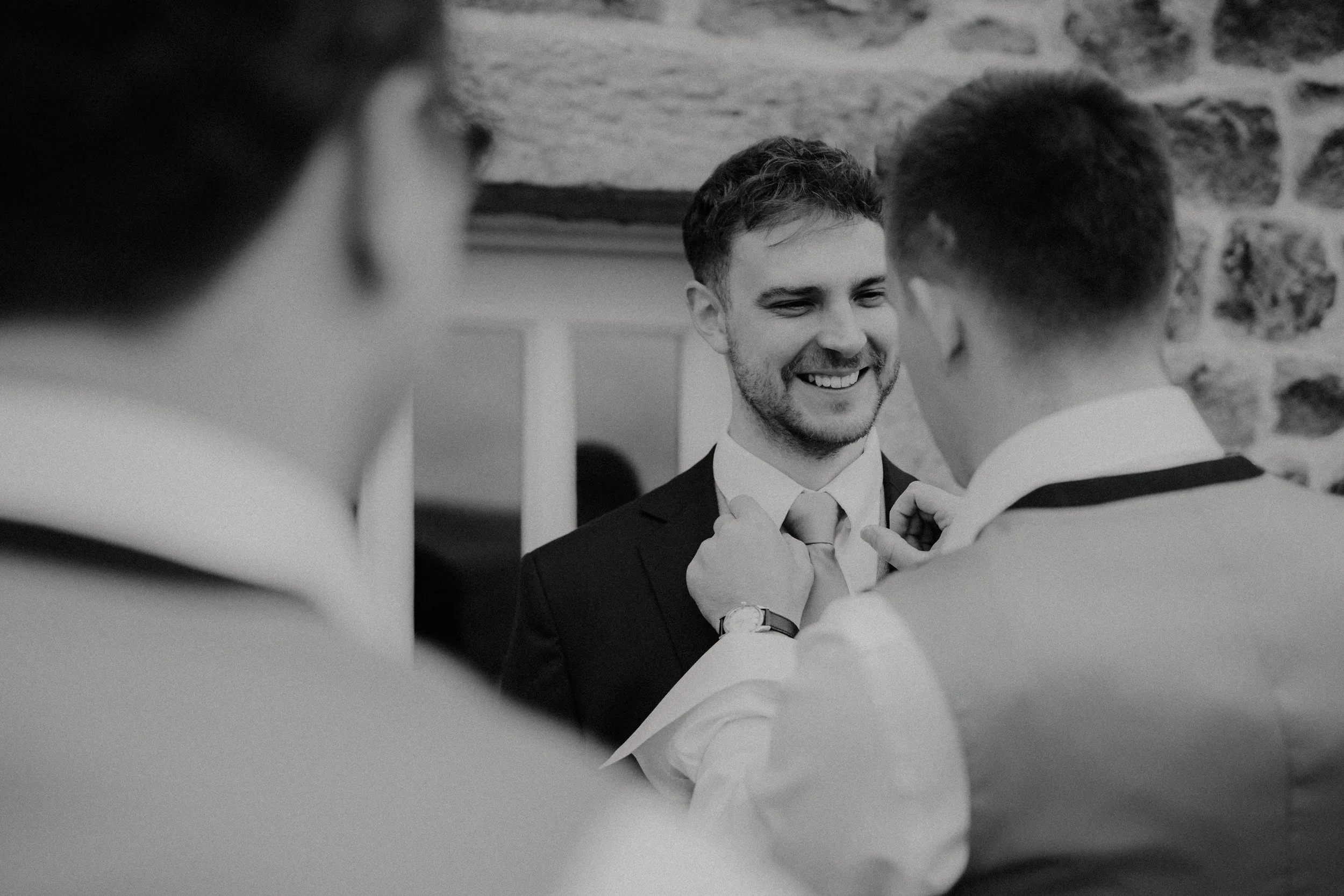 Groom Prep - Candid Black and White Wedding Photography by photoJMO