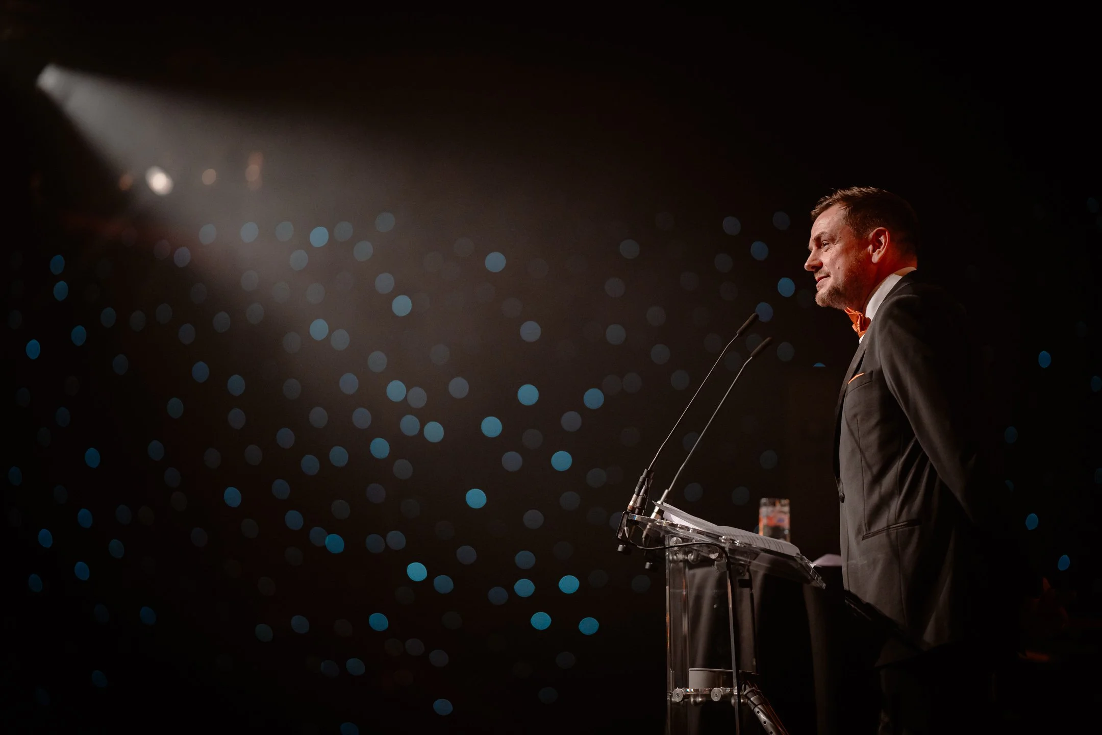 A speaker on stage at Centenary Pavillion, Elland Road -by Leeds Event Photographer photoJMO