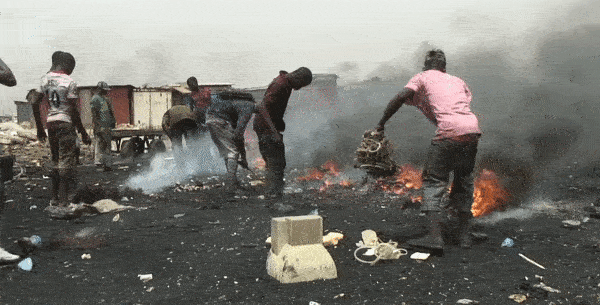 e-waste in ghana burning computer and phone trash in landfill