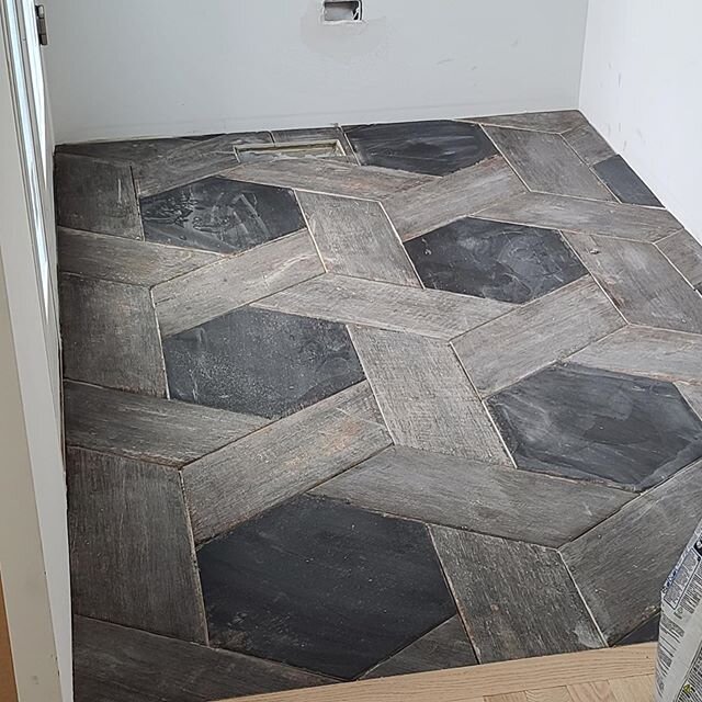 Work in progress! Our client just shared this photo of his Mudroom Floor tile being installed. ❤️ this pattern of interlocking plank and hex.  There are many different patterns you can create with these pieces too, as well as other color options avai