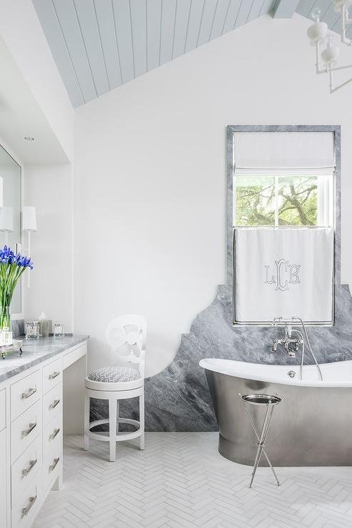 curved-marble-slab-behind-bathtub.jpg