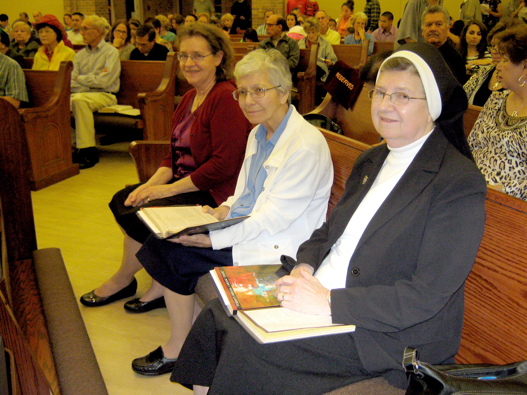  Sisters Jeanne Marie Ulica (right) and Jo Goolish (left) attend a reunion of the former St. Francis Academy in San Antonio, Texas, along with Sister Yolanda Escamilla. 